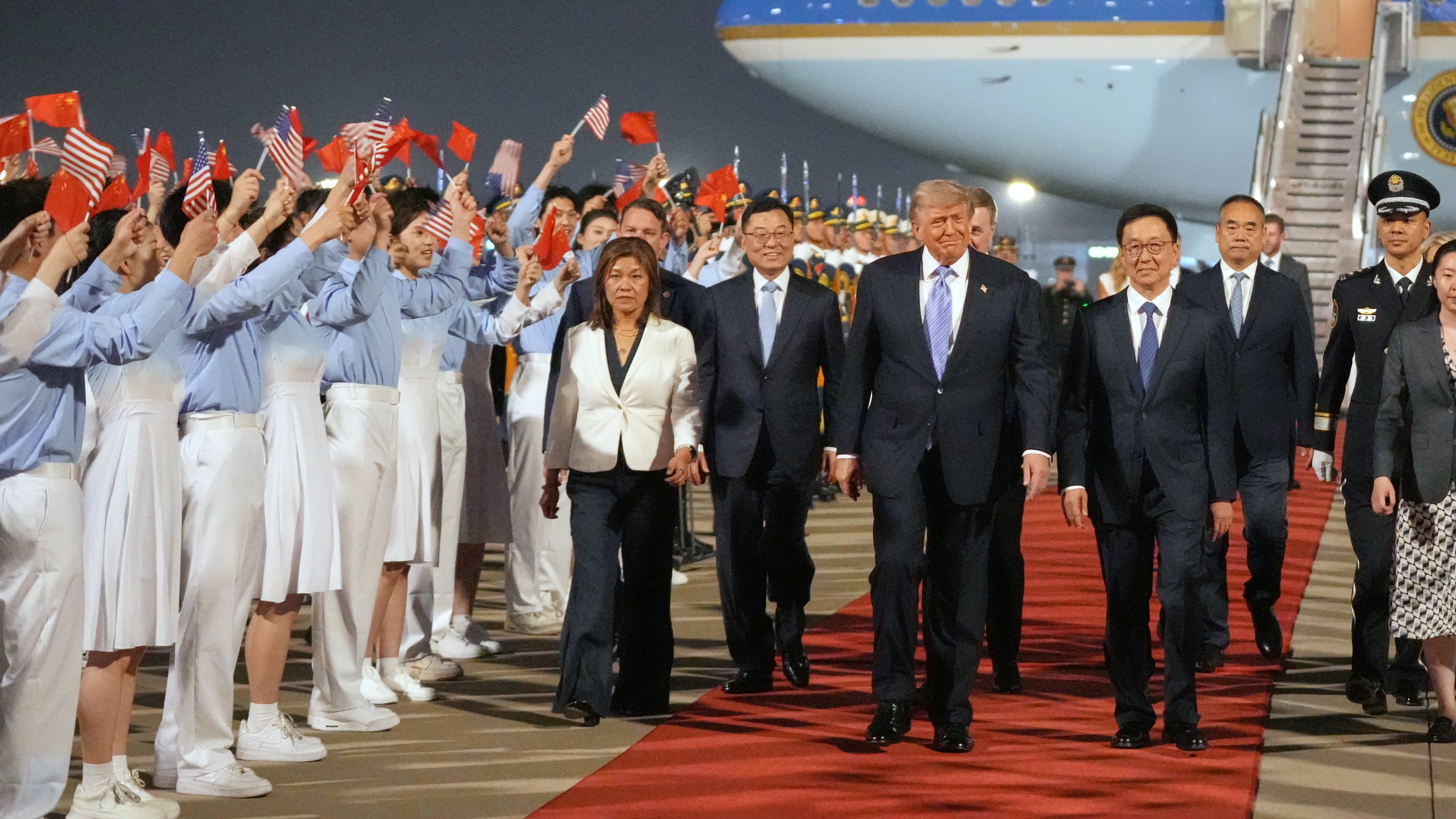 President Donald Trump walks with China's Vice President Han Zheng during a welcome ceremony Wednesday, May 13 (local time), 2026, at Beijing Capital International Airport in Beijing. 