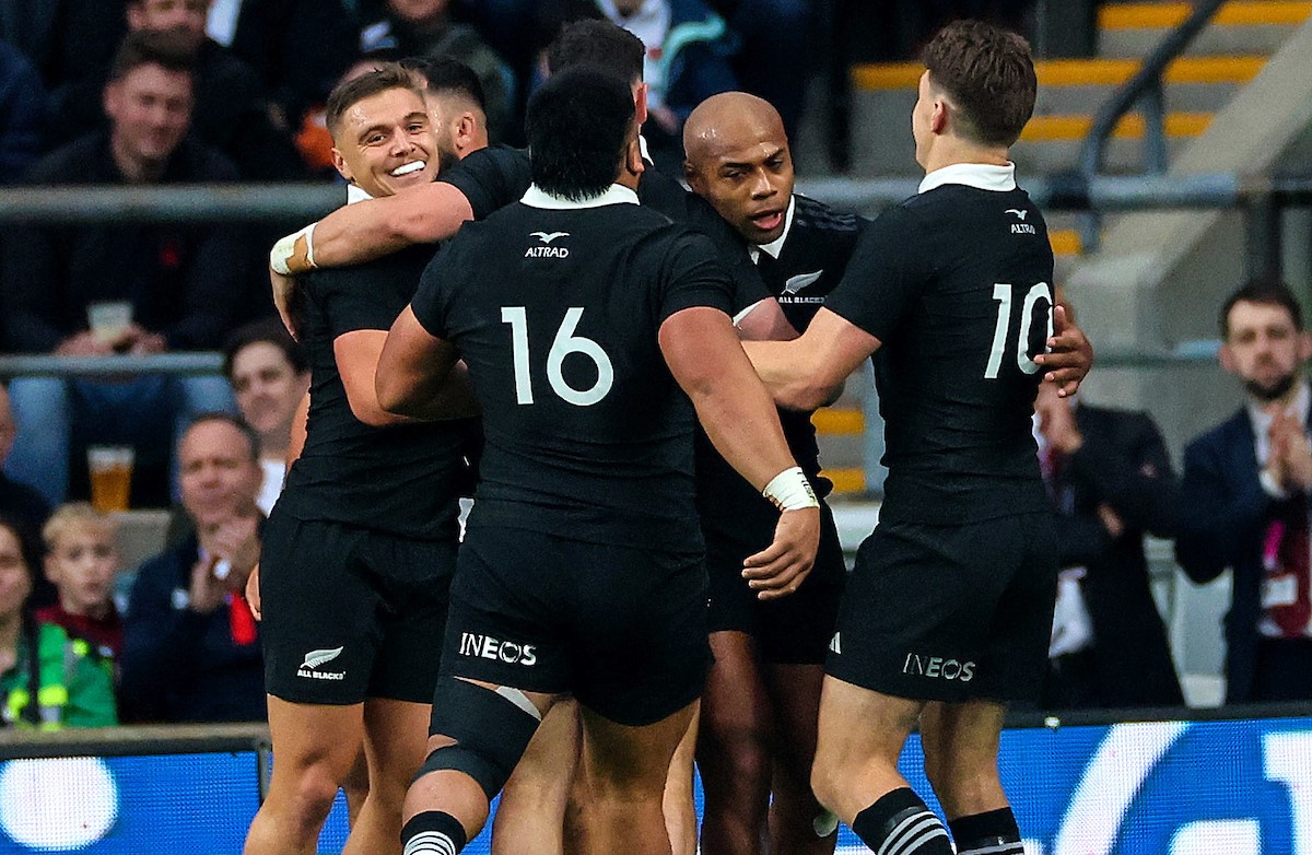 The All Blacks celebrate Mark Tele'a's second try which helped give them the lead against England at Twickenham.