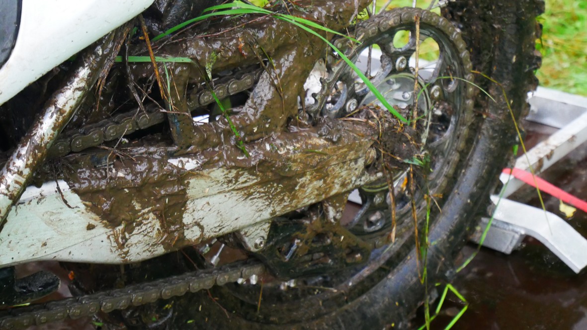 Muddied dirt bike.