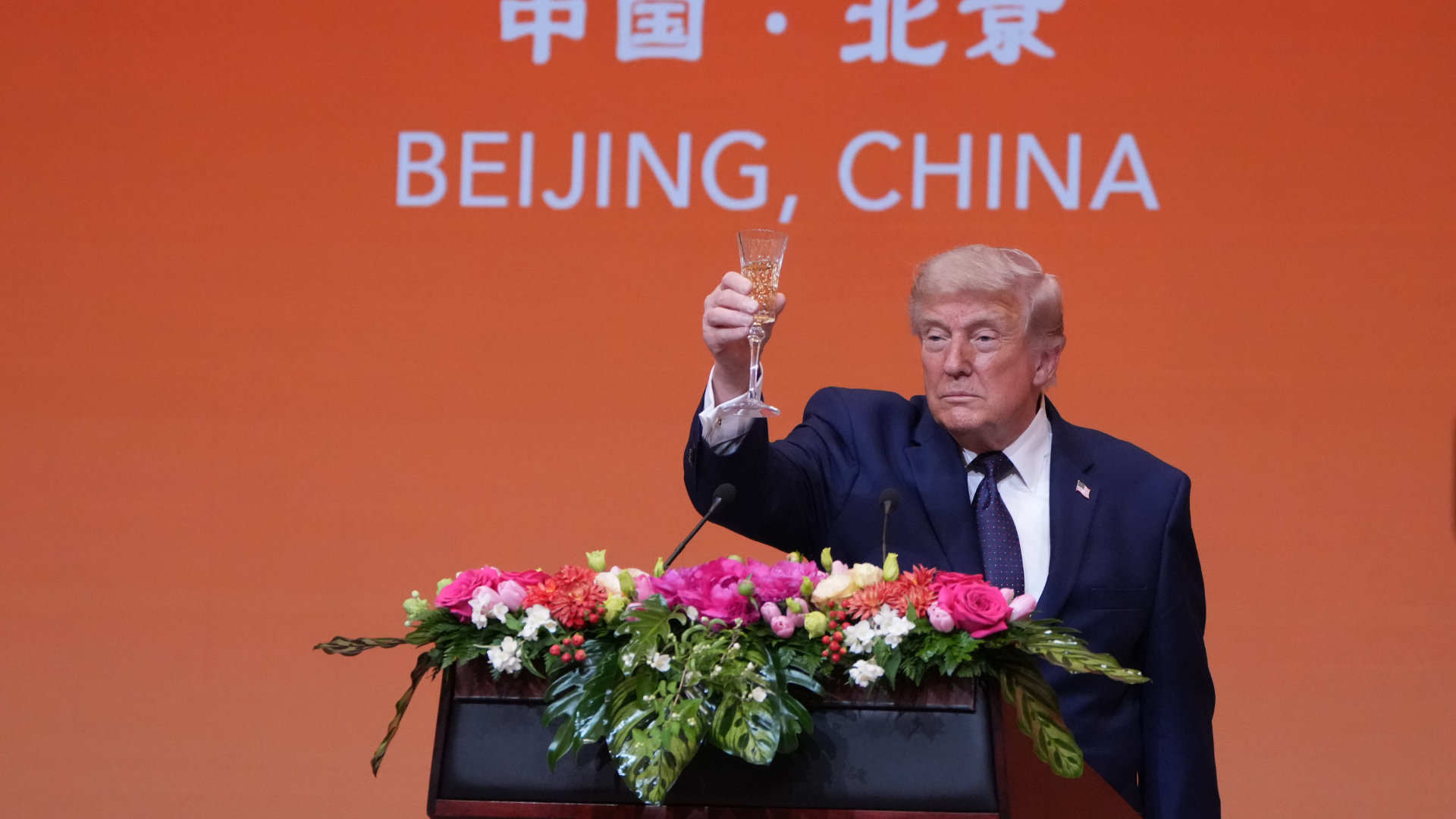 US President Donald Trump proposes a toast during a state dinner with China's President Xi Jinping at the Great Hall of the People in Beijing, China.