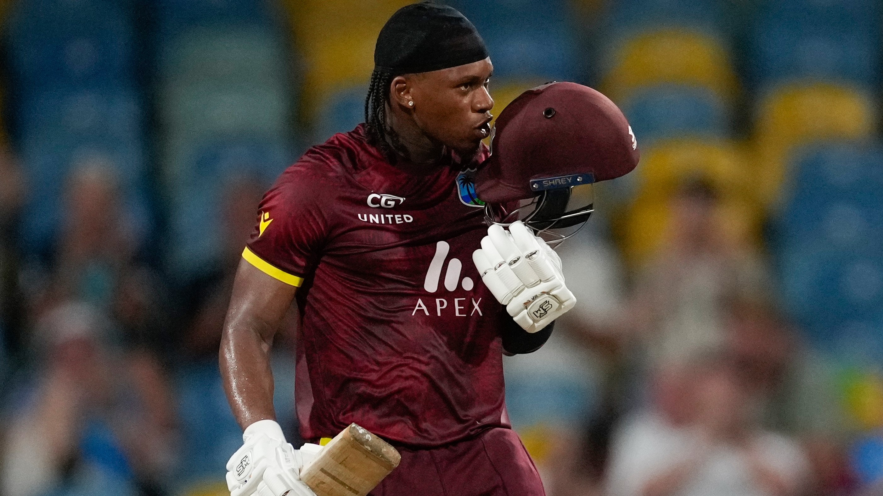  West Indies' Keacy Carty celebrates after he scored a century against England during the third ODI cricket match at Kensington Oval in Bridgetown, Barbados, November 6, 2024. 