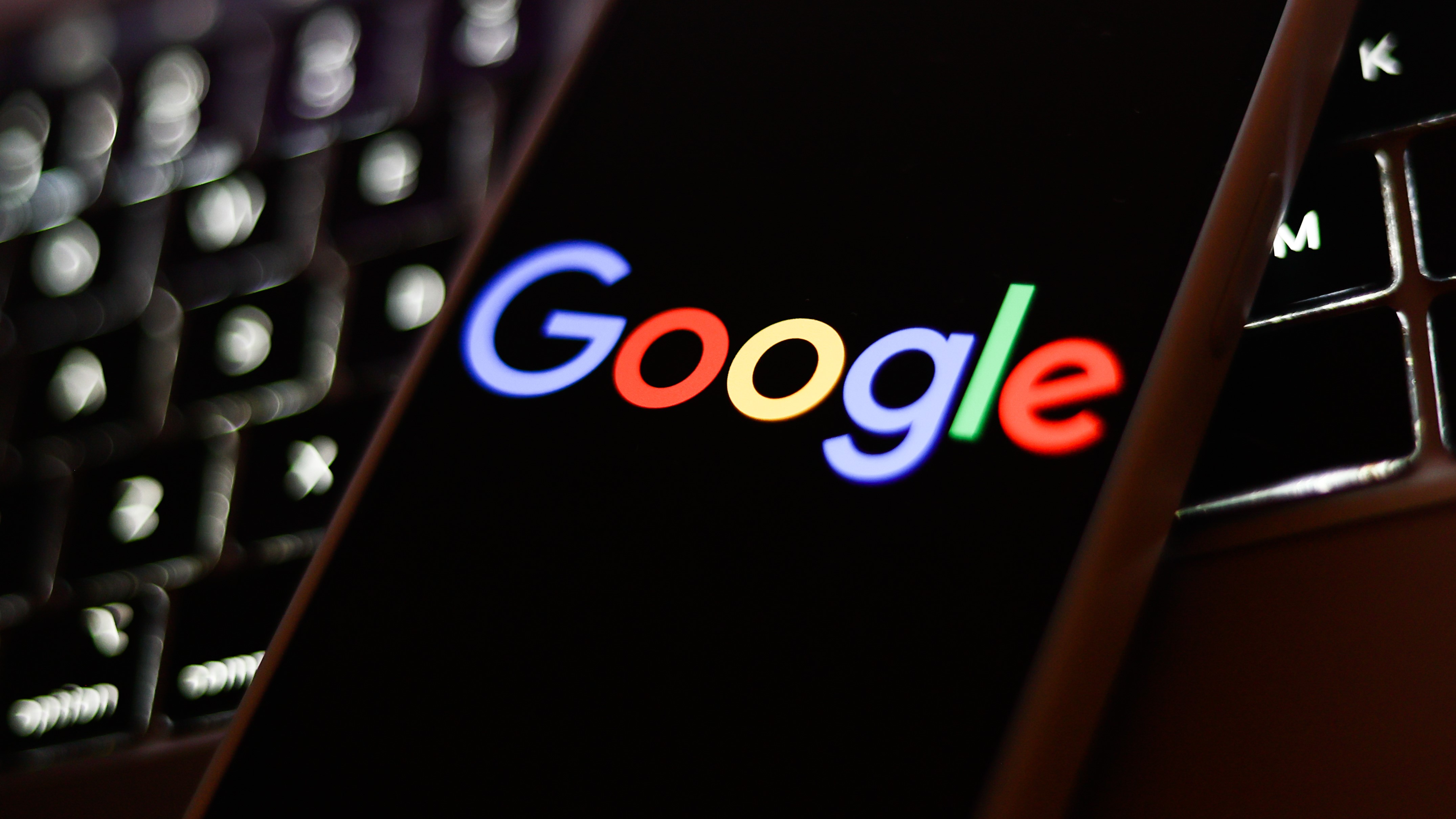 A Google logo displayed on a mobile phone. File photo.