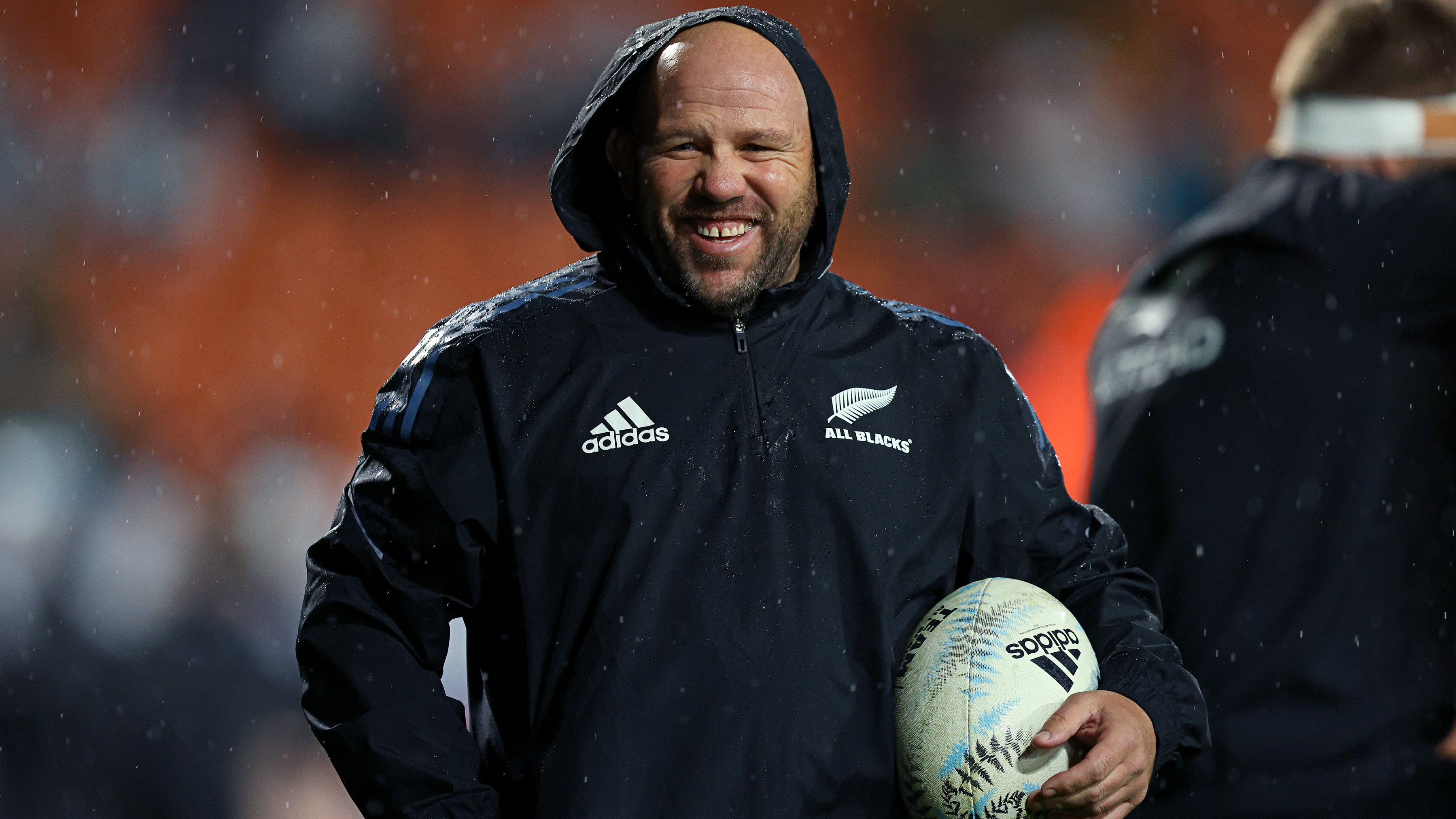 All Blacks assistant coach Jason Ryan enjoys the Waikato rain before his team's big win over the Pumas.