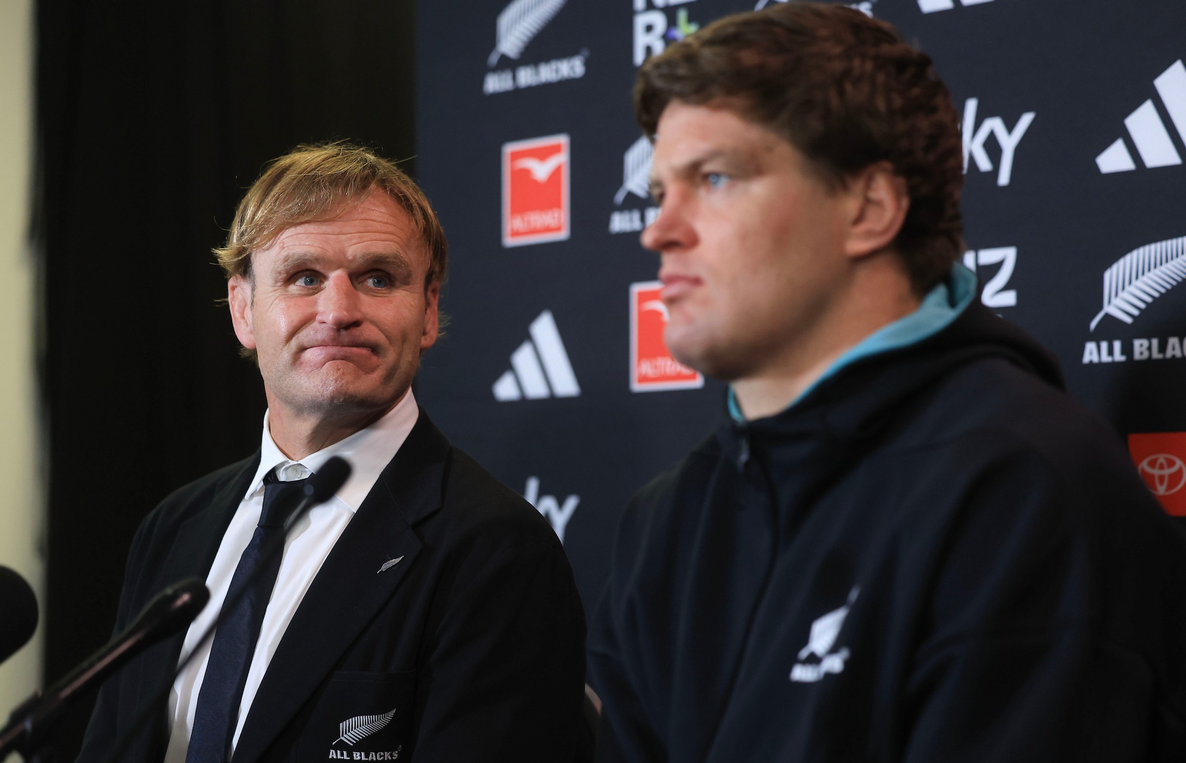 All Blacks head coach Scott Robertson, left, with skipper Scott Barrett after their team's narrow win over France.