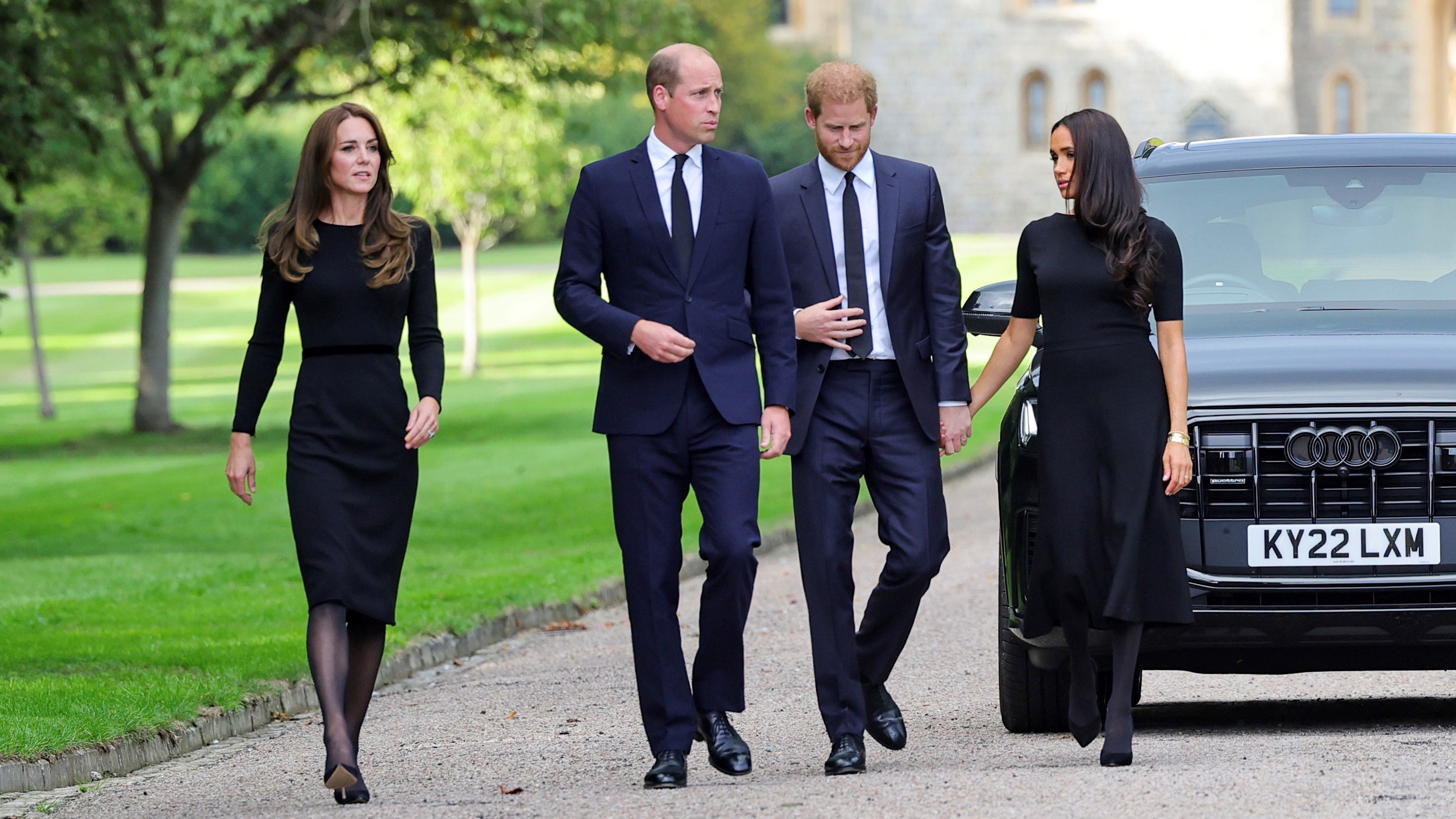 From left, Kate, Princess of Wales, Prince William, Prince of Wales, Prince Harry, and Meghan, Duchess of Sussex, at Windsor Castle.