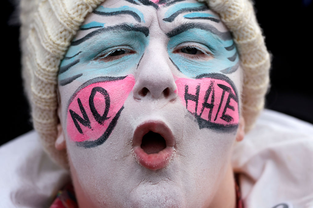 Someone protesting against Posie Parker in Glasgow in February 2023 