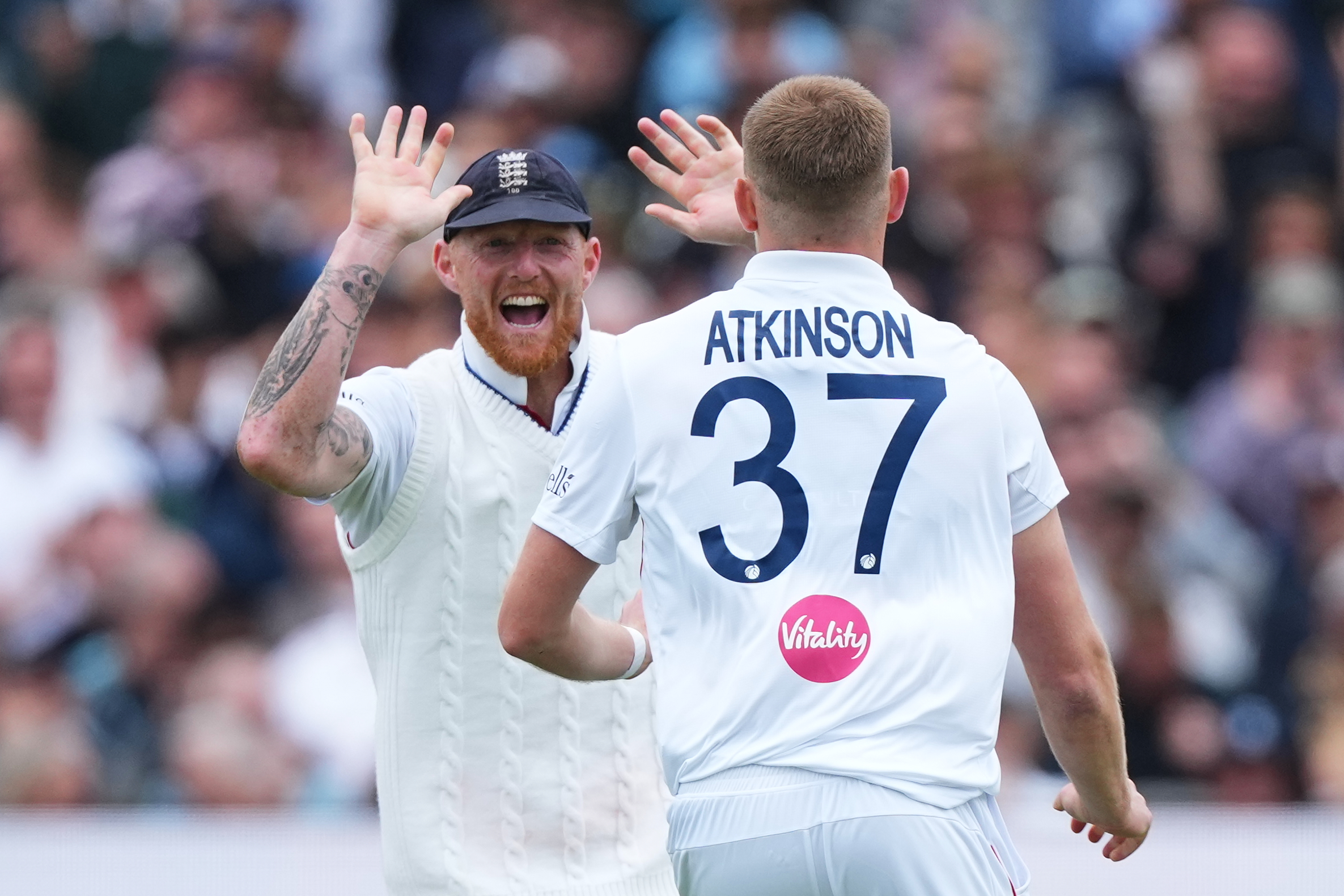 England's Gus Atkinson, right, celebrates with captain Ben Stokes after bowling out New Zealand's Matt Henry to win the Test match between England and New Zealand at Lord's cricket ground in London, Sunday, June 7, 2026.