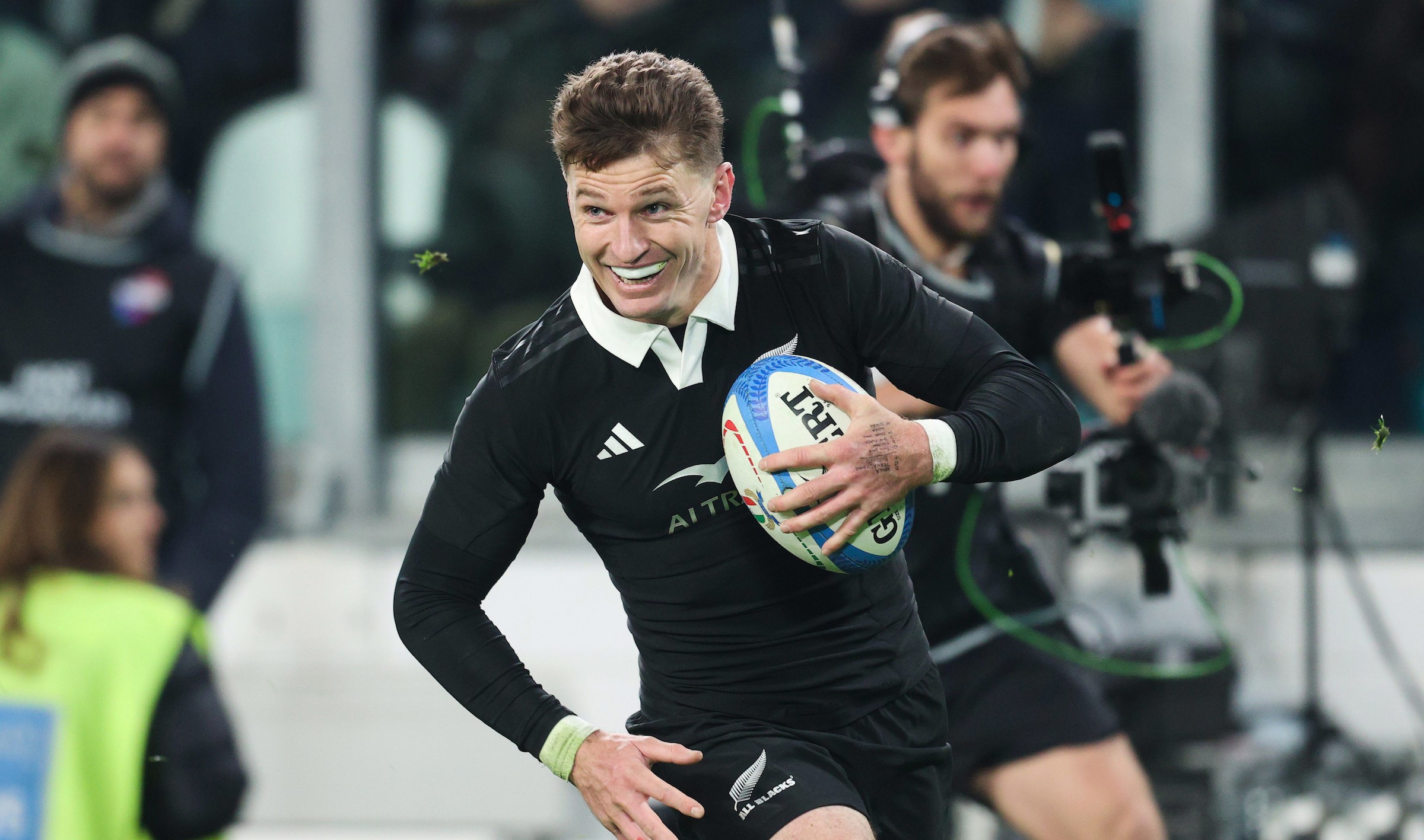 Beauden Barrett goes in for his late try against Italy.