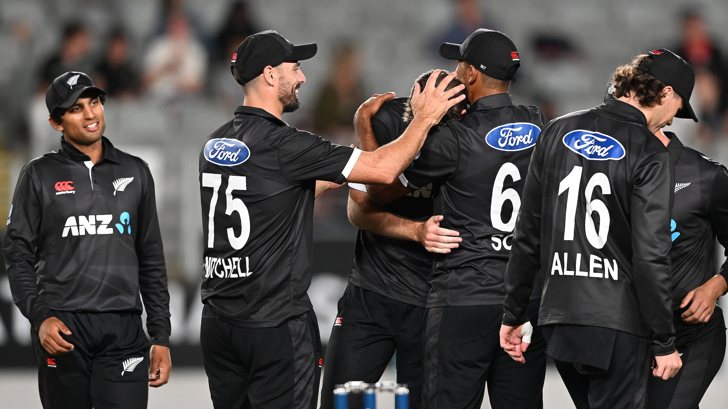Henry Shipley is mobbed by team mates after his 5th wicket.