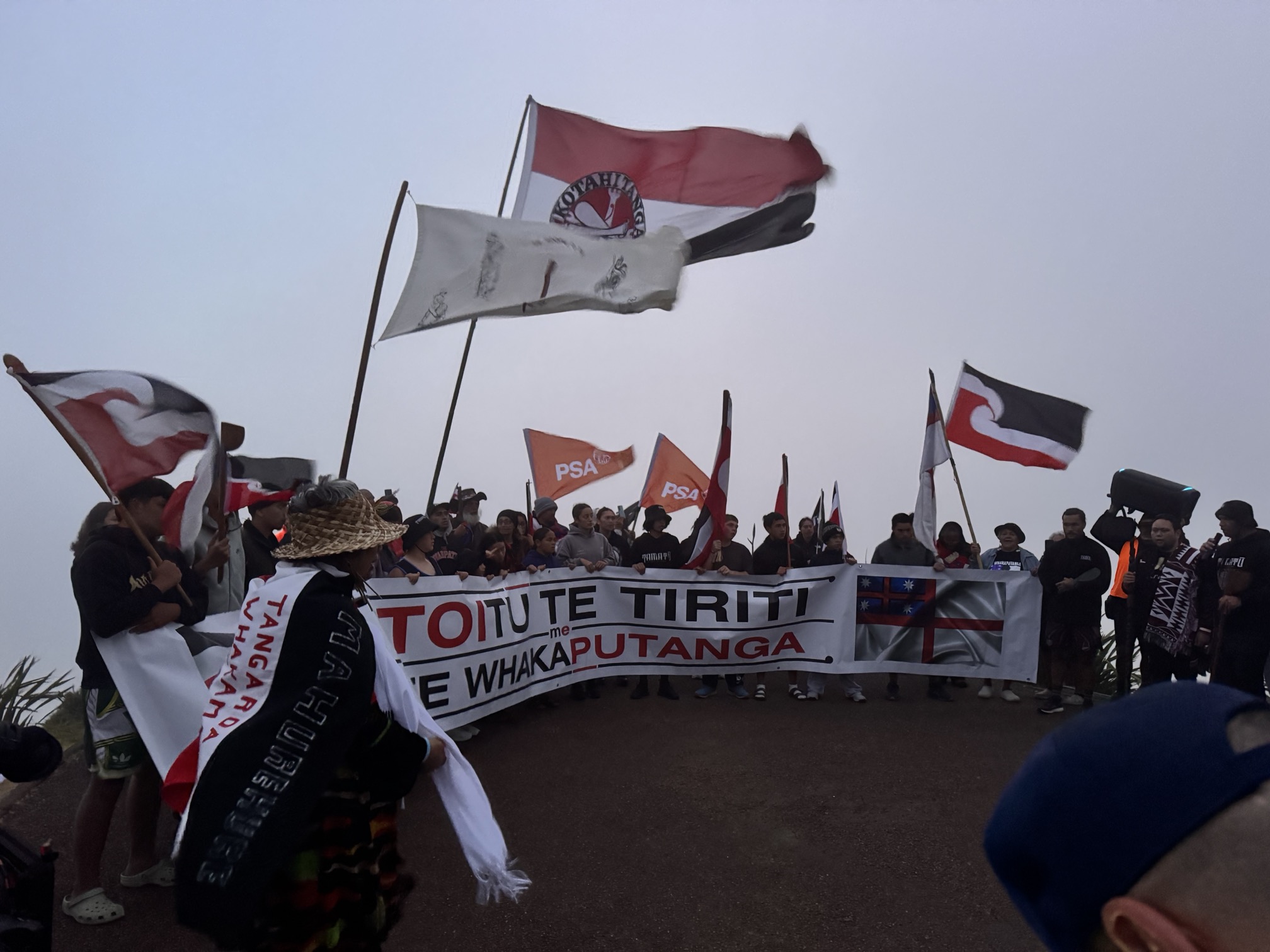 The start of Toitū Te Tiriti hīkoi at Te Rerenga Wairua / Cape Reinga.