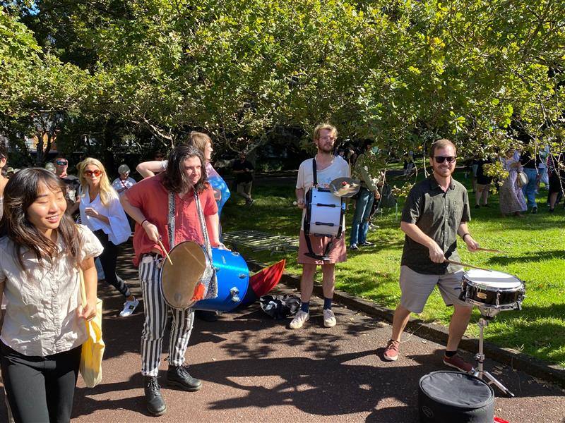 A drum band plays at the Posie Parker counter-protest at Albert Park.