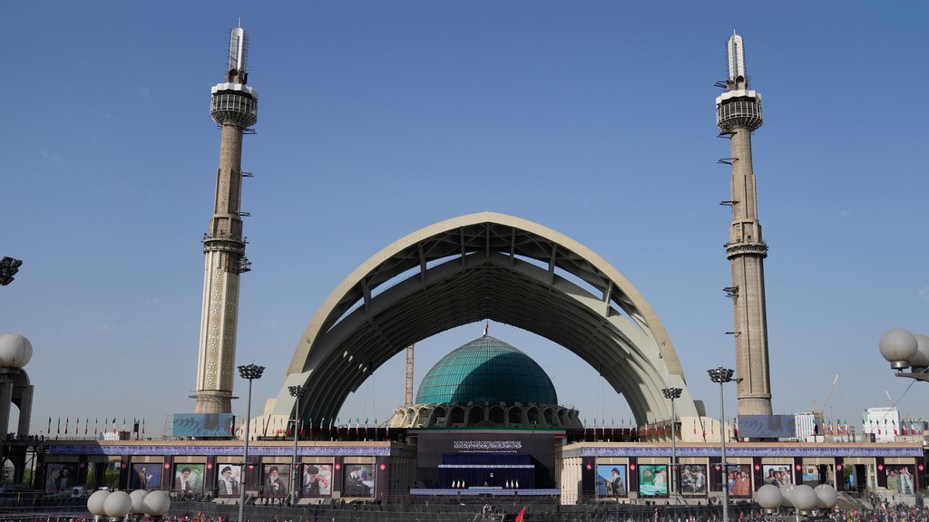 The coffins of slain Iranian Supreme Leader Ayatollah Ali Khamenei and members of his family are displayed on a stand at the start of the dayslong funeral ceremonies at the Imam Khomeini Mosalla Grand Mosque in Tehran, Iran.