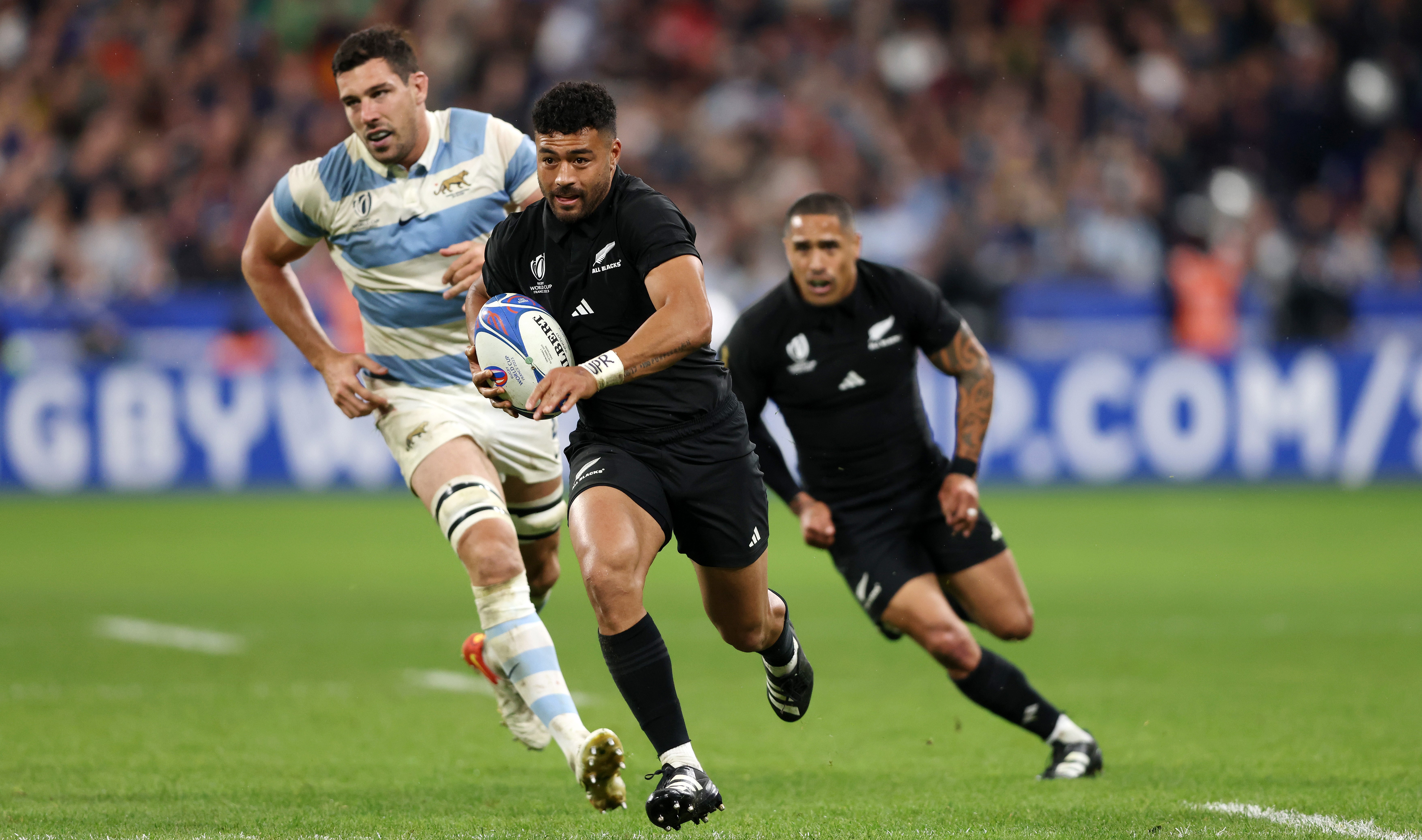 Richie Mo'unga makes a break for the All Blacks during his team's World Cup semifinal win over Argentina in 2023.