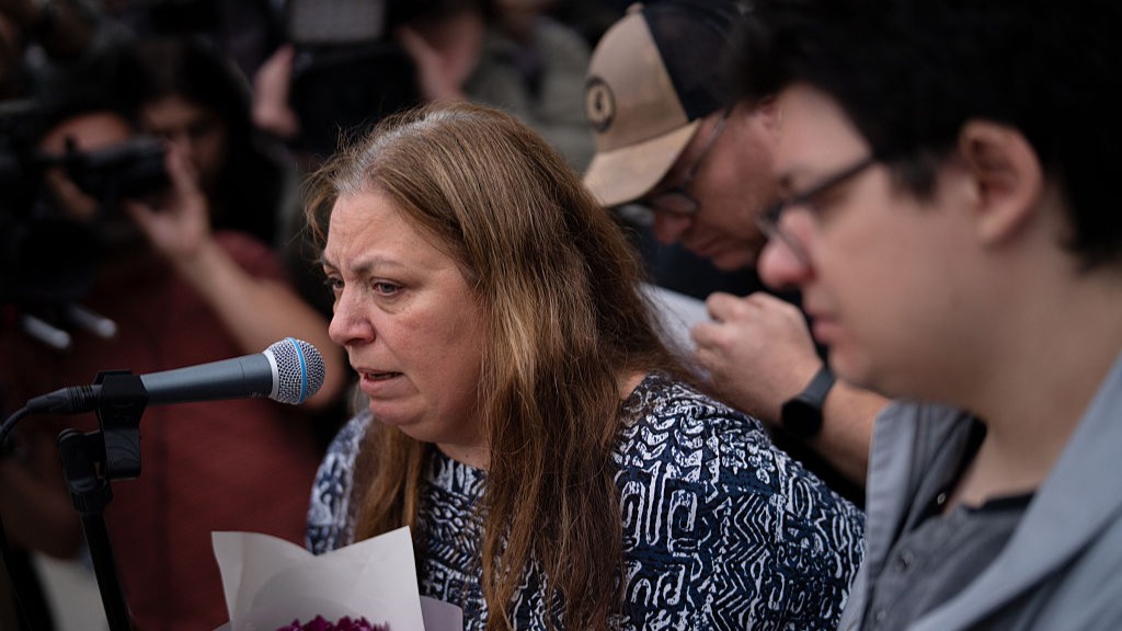 The mother of shooting victim, 10-year-old Matilda, addresses members of the public during a candlelight vigil at Bondi Pavilion at Bondi Beach on December 16, 2025 in Sydney, Australia.
