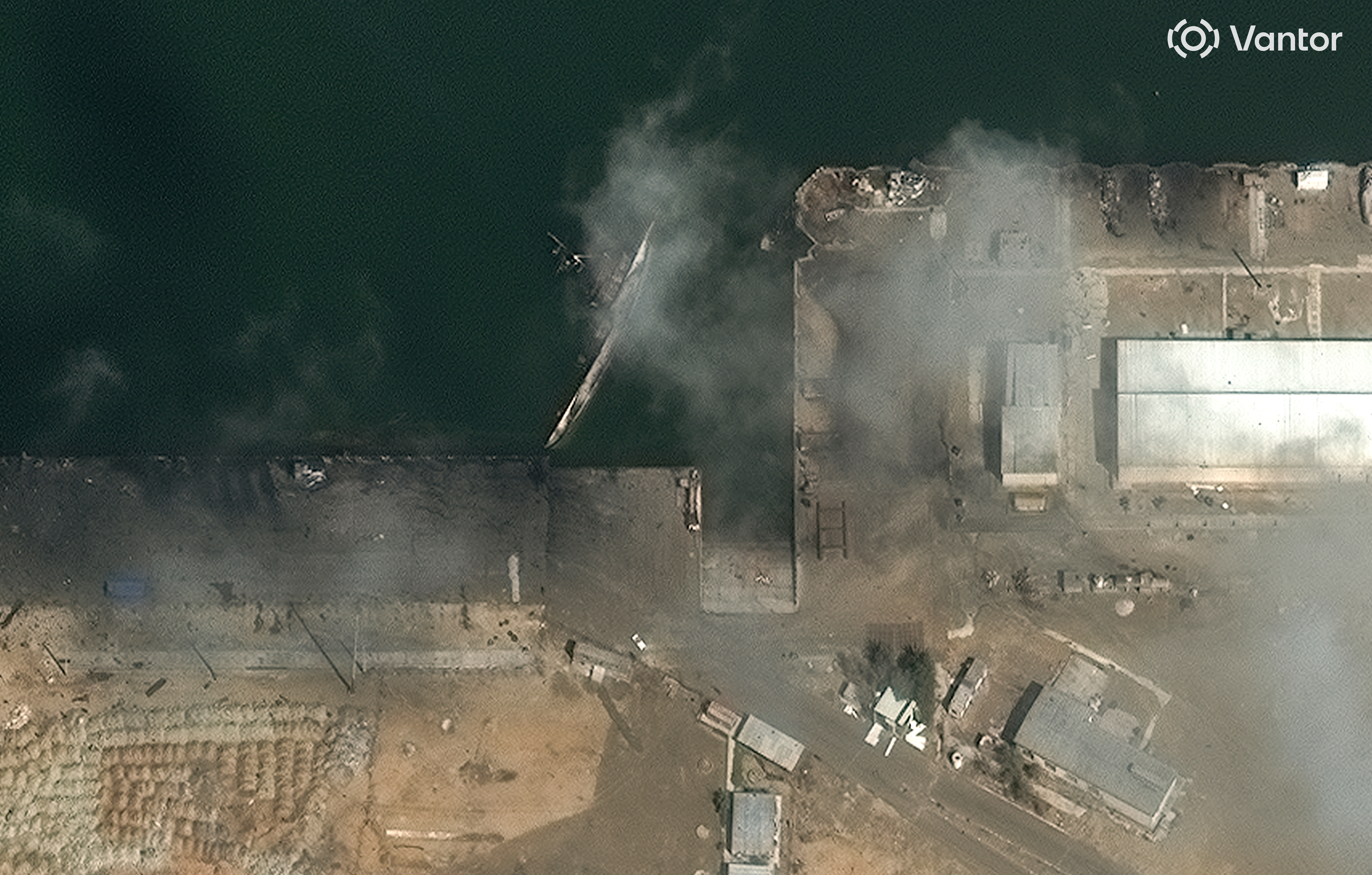This satellite image provided by Vantor shows a view of capsized ship at Konarak Naval base in Iran on Wednesday, March 4, 2026.   (Satellite image ©2026 Vantor via AP) 