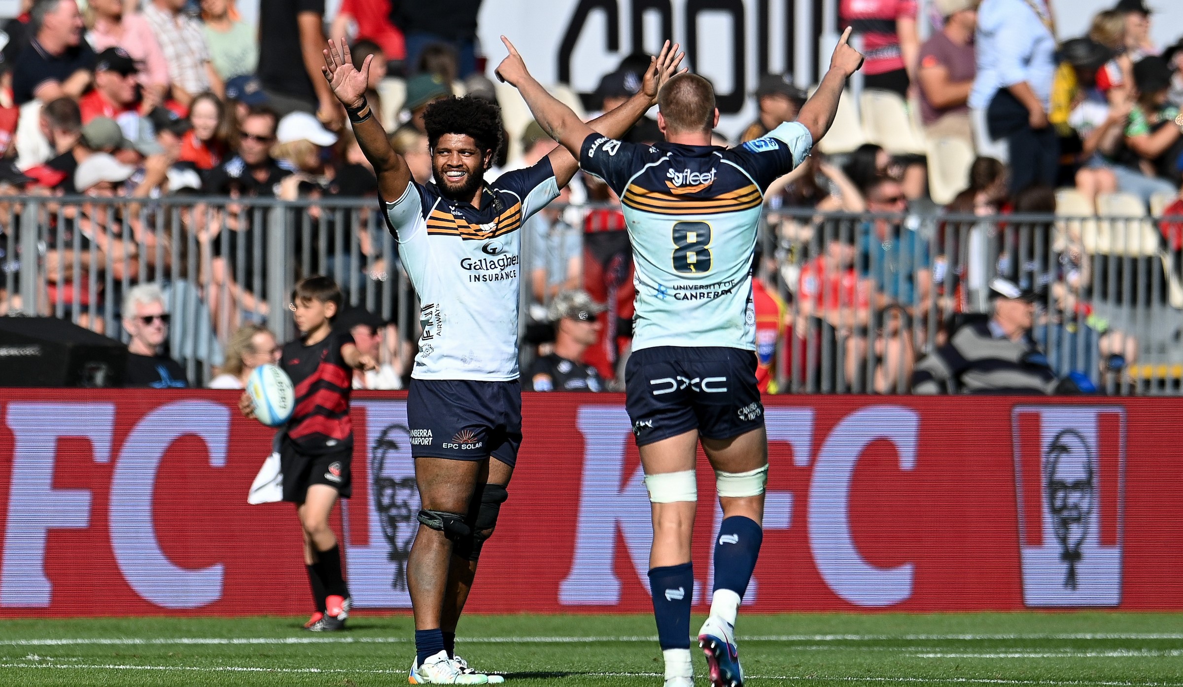 Rob Valetini and Charlie Cale of the Brumbies celebrate their team's historic win over the Crusaders in Christchurch.