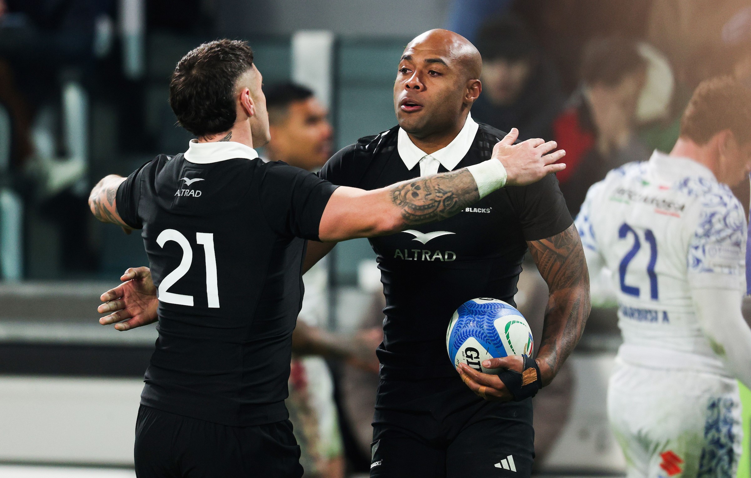 Mark Tele'a celebrates the second-half try which made the game safe for the All Blacks in Turin.