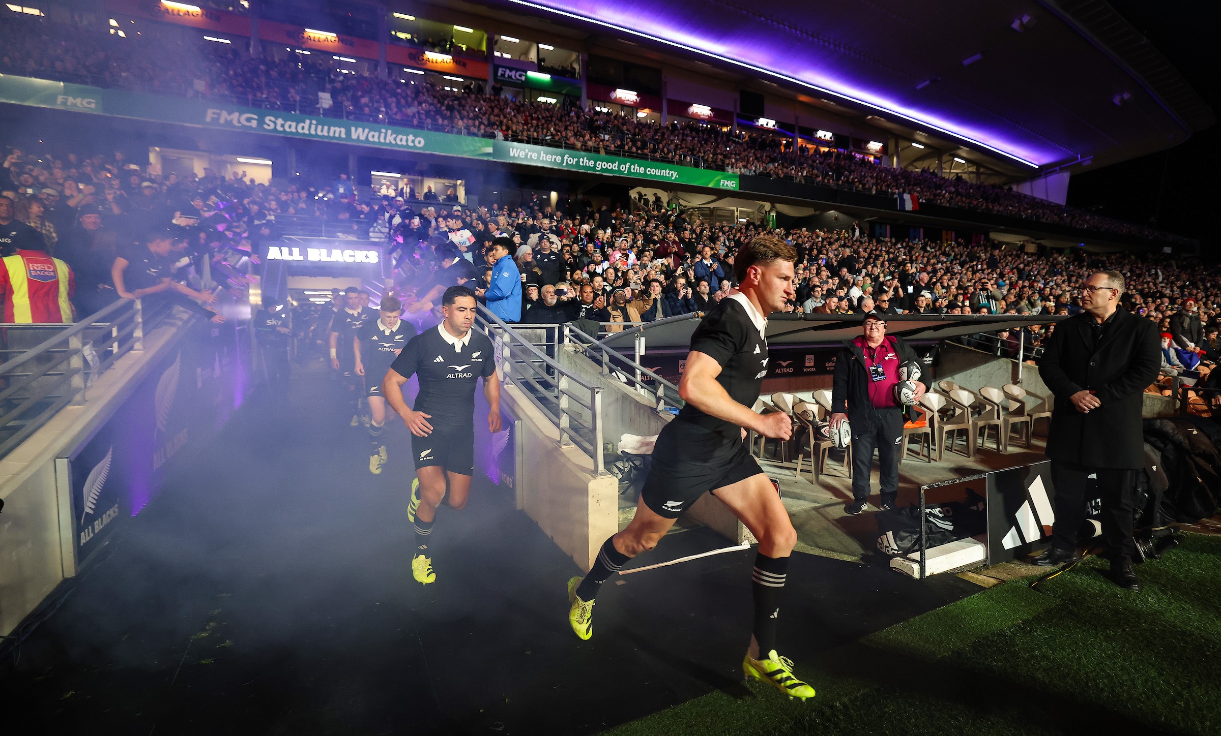 All Blacks midfielder Jordie Barrett runs on to the Waikato Stadium pitch for the third Test against France.