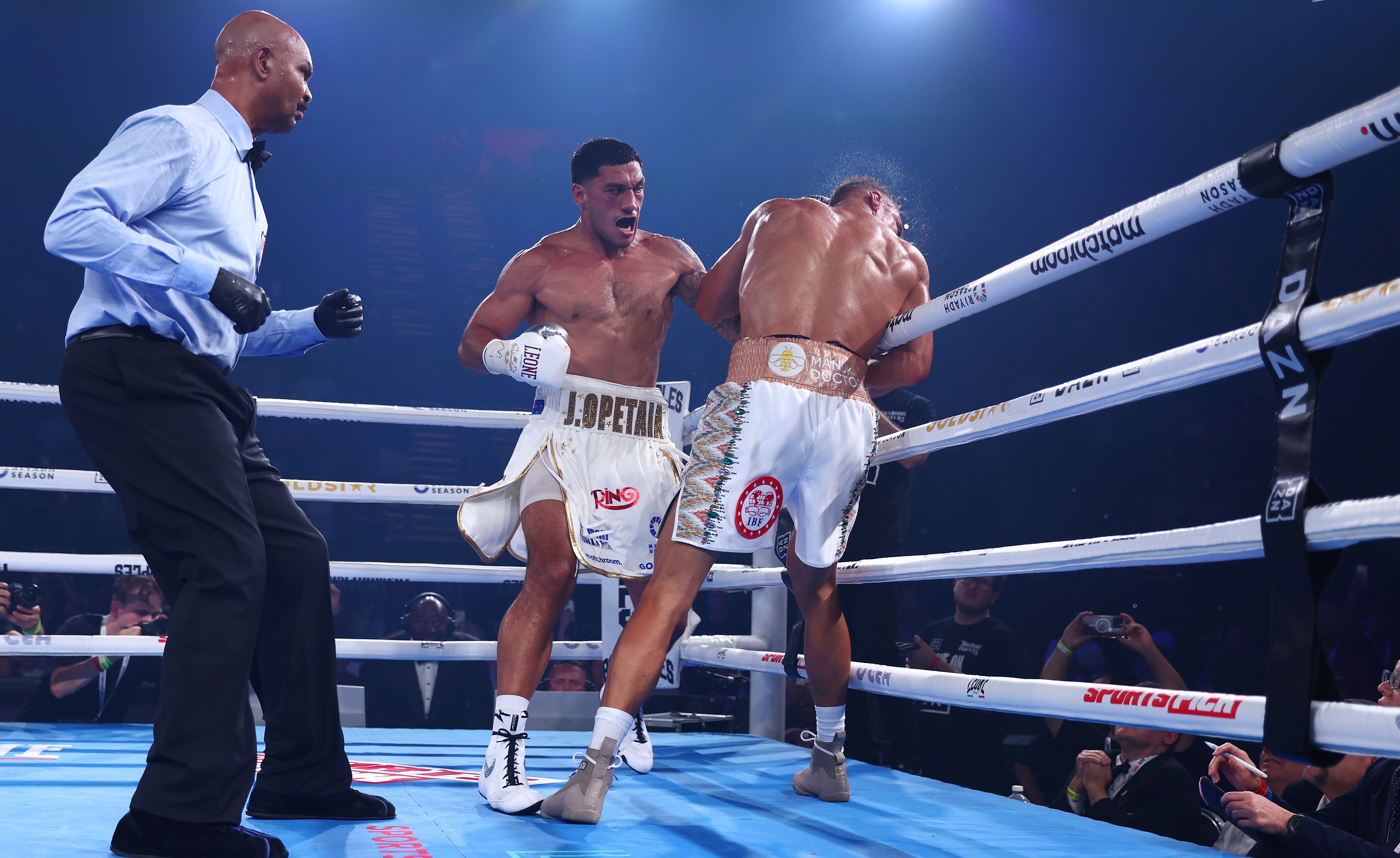 Opetaia lands the final blow as Nyika gets tangled on the ropes.