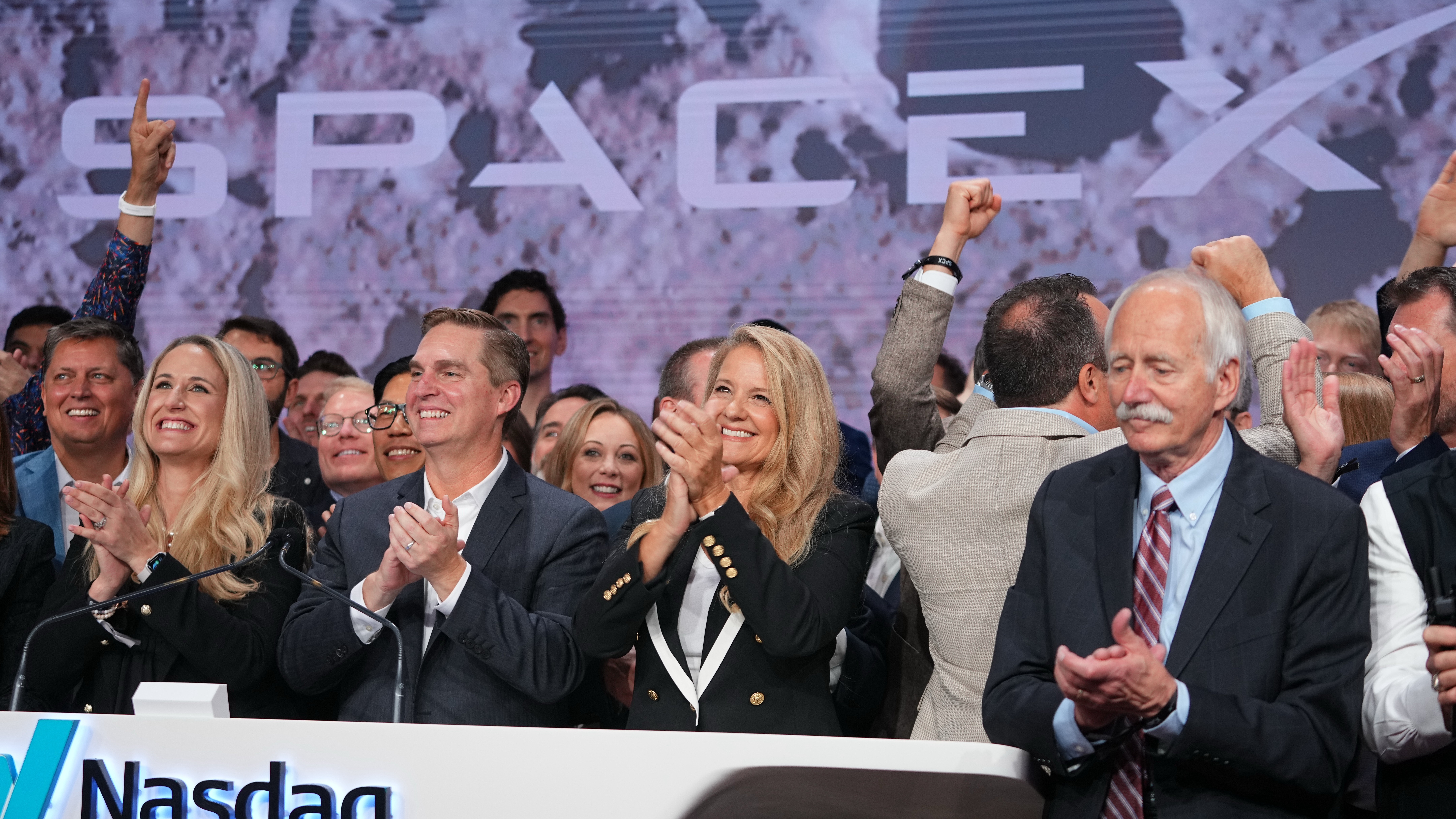 Gwynne Shotwell, President and COO of SpaceX celebrates with colleagues during a bell ringing ceremony for the IPO of SpaceX at the Nasdaq MarketSite in New York, Friday, June 12, 2026, in New York. 