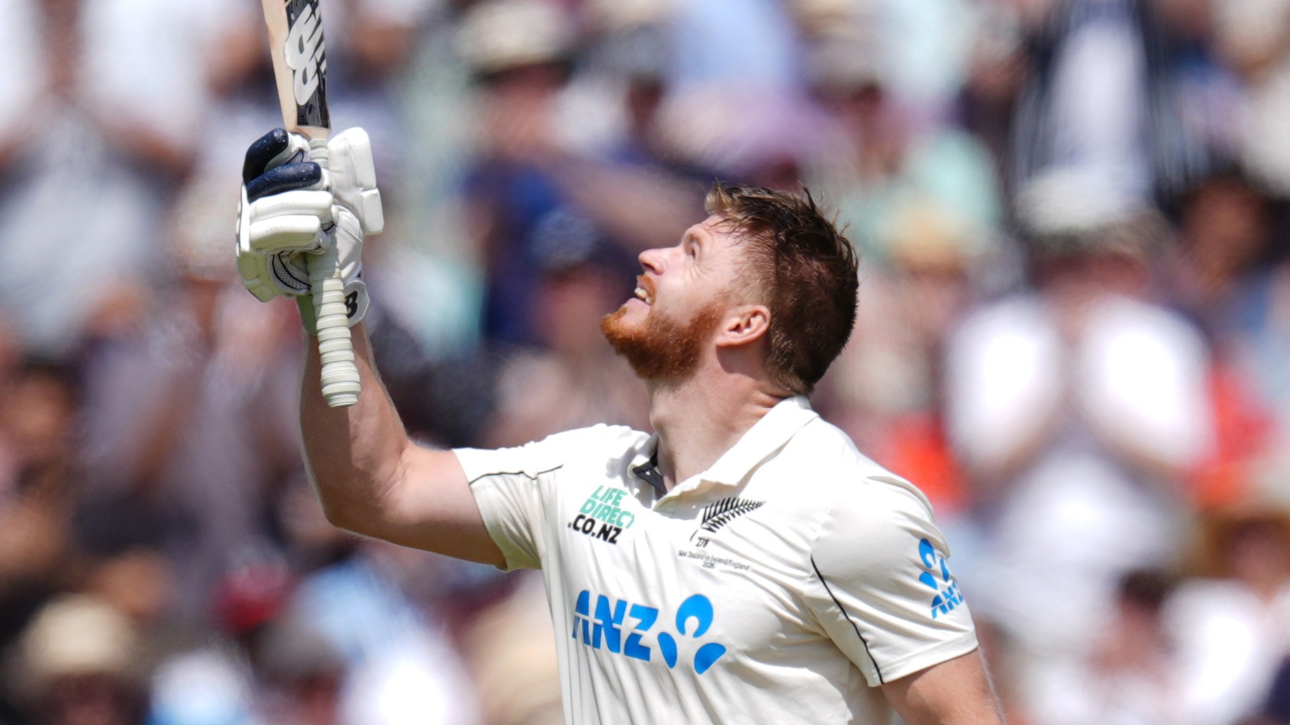 New Zealand's Glenn Phillips celebrates his century, on day two of the second cricket test between England and New Zealand, in London.