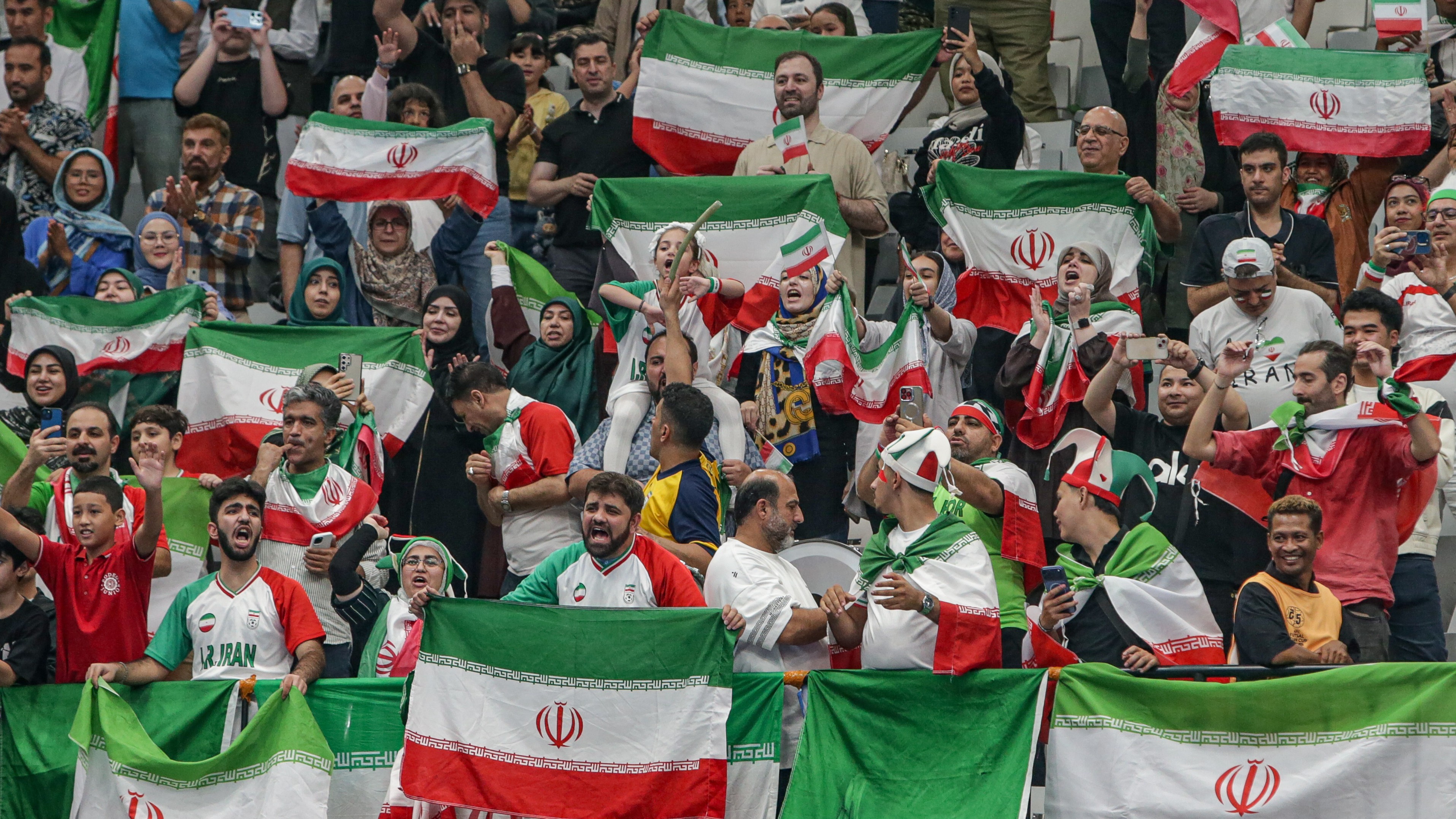 Supporters of Iran celebrate their win over Indonesia during the final match between Indonesia and Iran at the AFC Futsal Asian Cup 2026 in Jakarta, Indonesia, on February 7, 2026. Iran becomes champions after defeating Indonesia 5-4 in a penalty shootout.