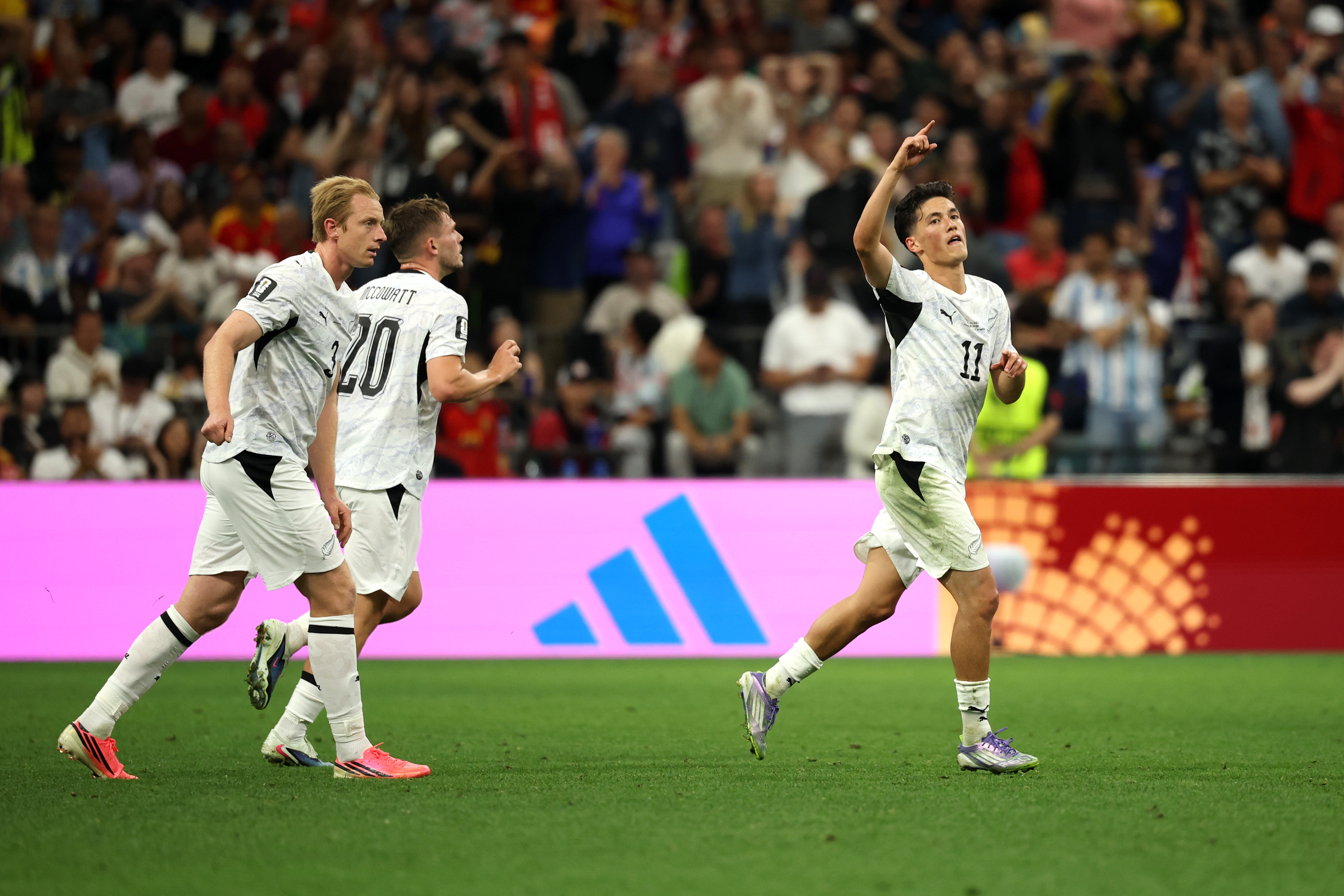 Eli Just celebrates scoring against Belgium. 