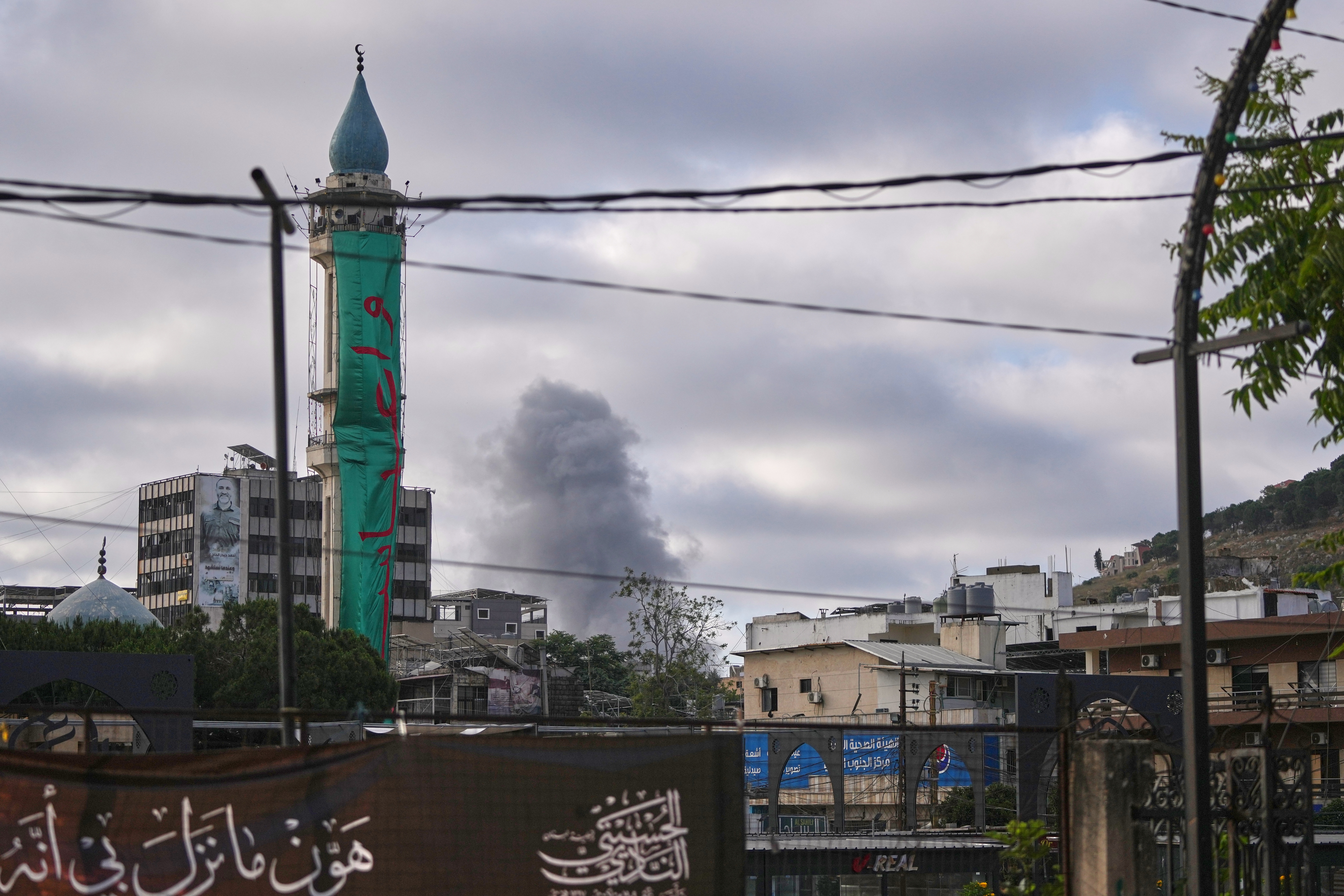 Smoke rises from the site of an Israeli airstrike on the outskirts of Nabatiyeh during Ashoura, when Shiites commemorate the martyrdom of Imam Hussein, the grandson of the Prophet Muhammad, in Nabatiyeh, southern Lebanon, Friday, June 26, 2026.
