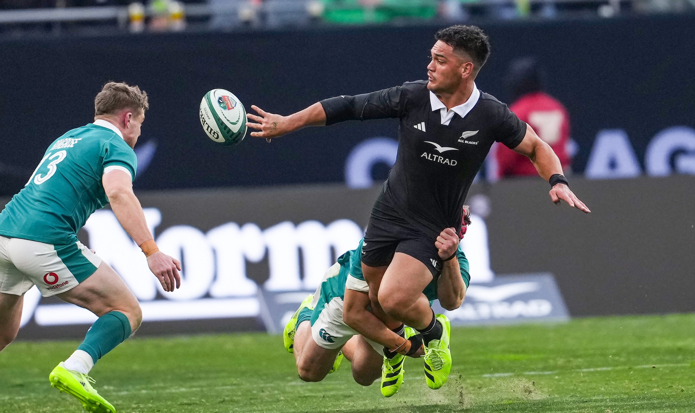 All Blacks midfielder Quinn Tupaea in action against Ireland.