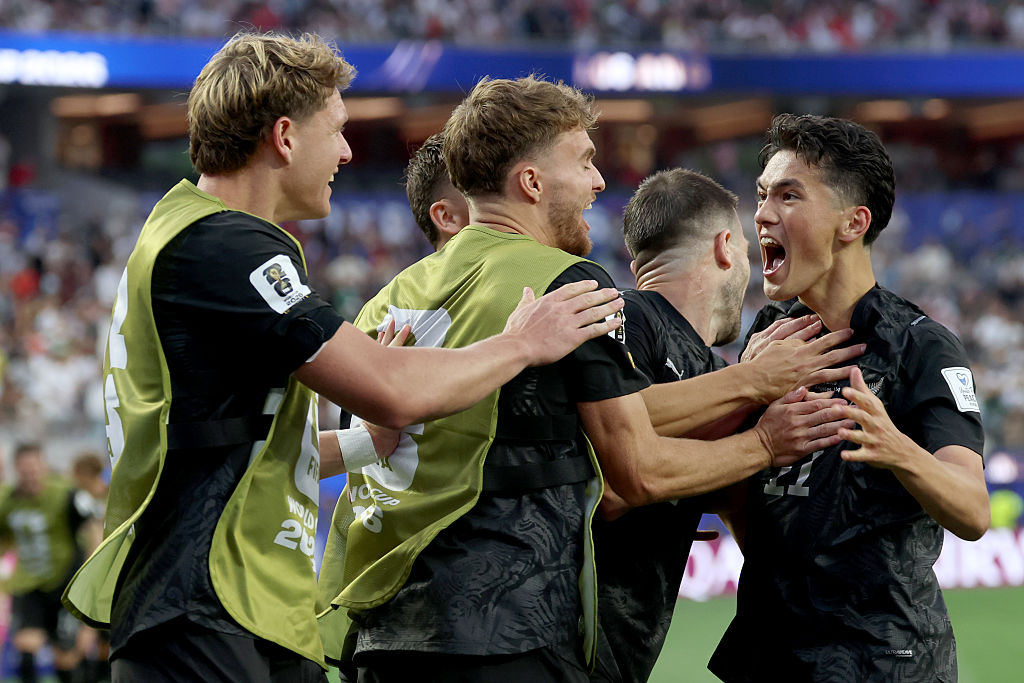 Eli Just celebrates his second goal against Iran