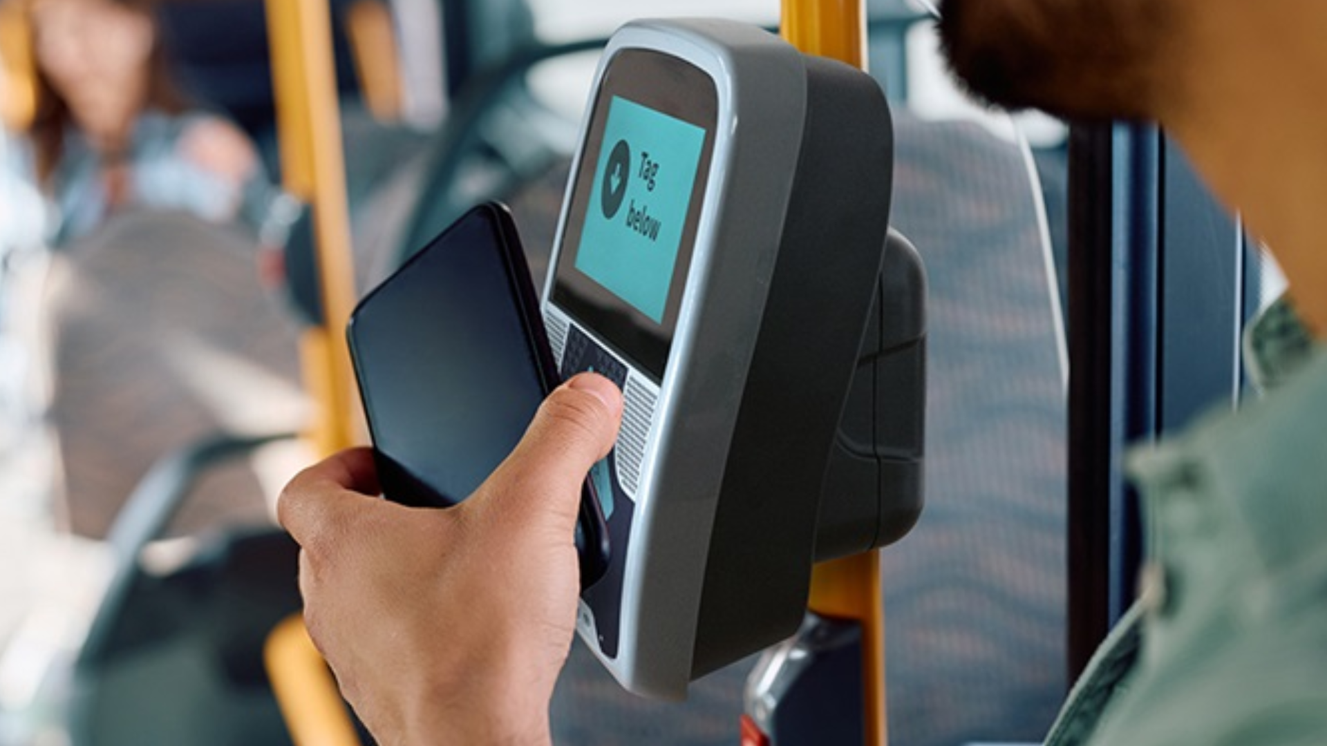 A person uses their phone on a Motu Move reader (file image).