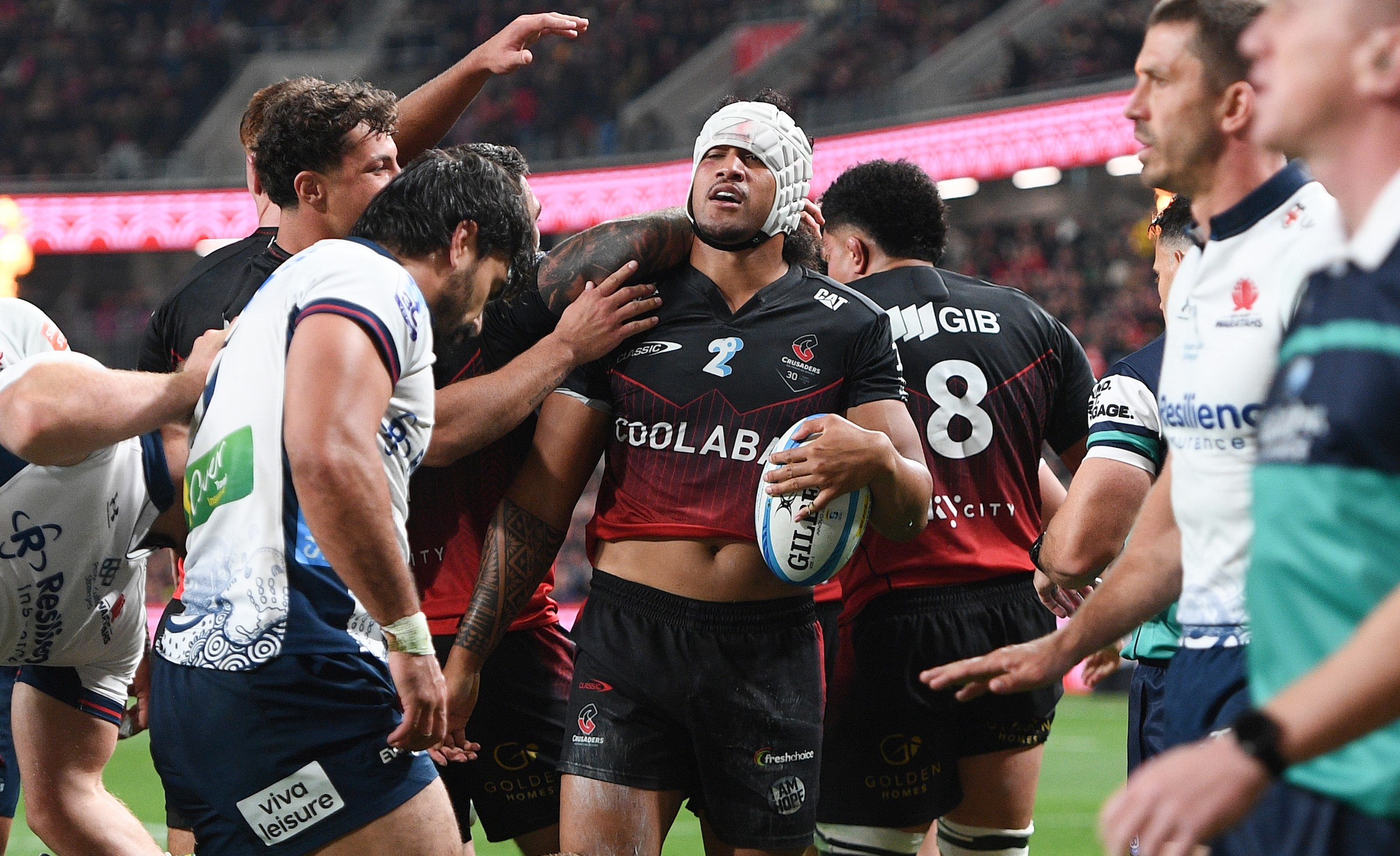 Leicester Fainga'anuku celebrates a try for the Crusaders against the Waratahs at Te Kaha stadium.