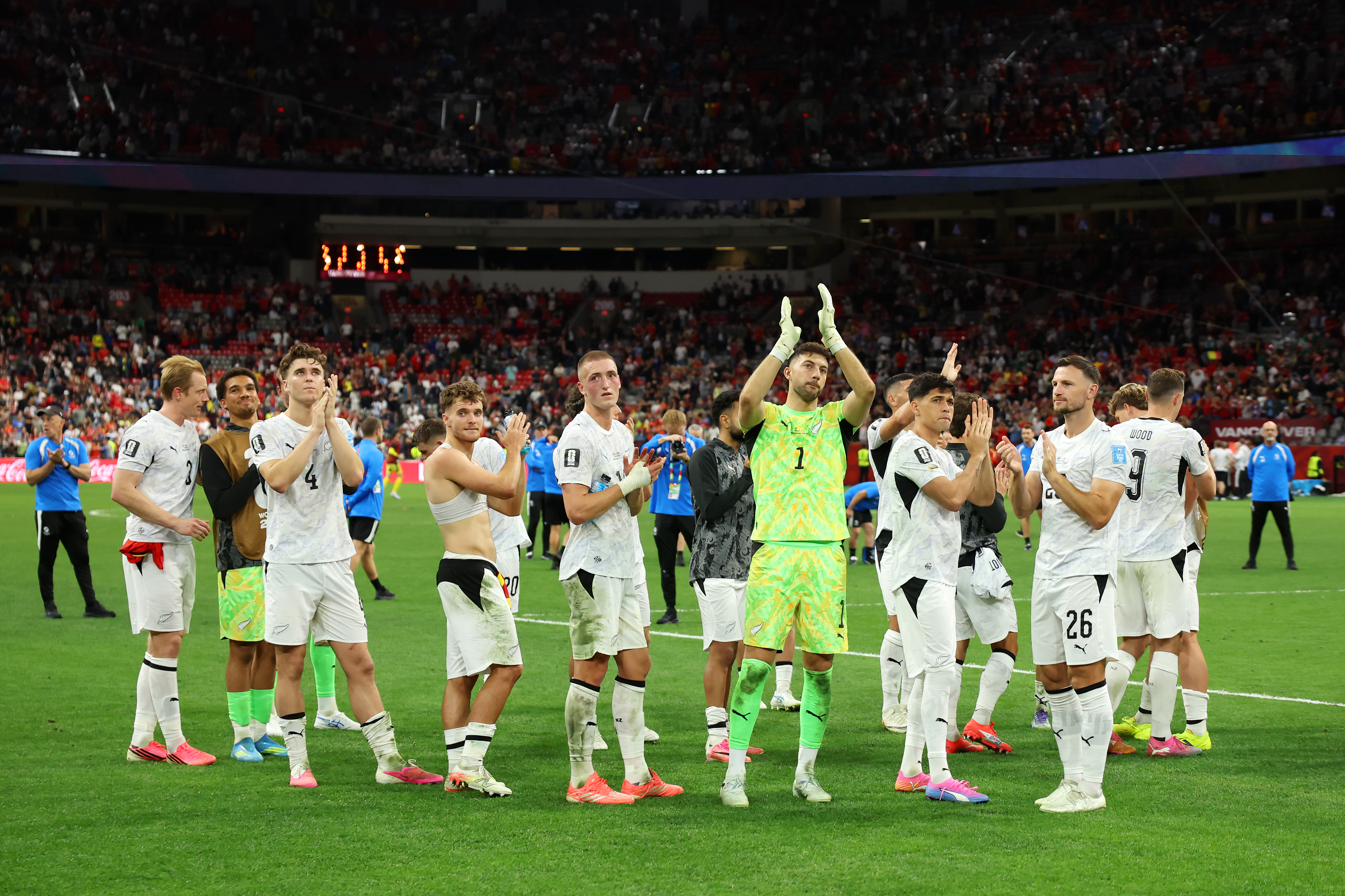 The All Whites applaud their fans after their 5-1 defeat to Belgium at BC Place, Vancouver.