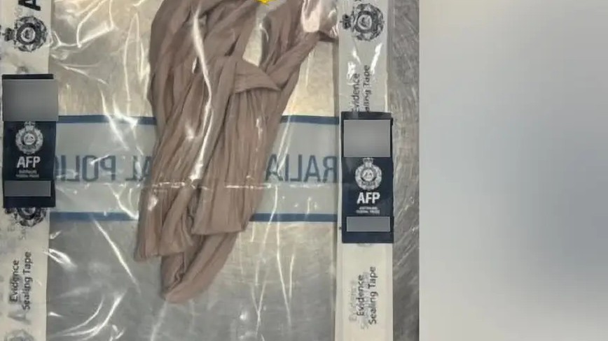 The beige strap Walter Alcivar used to secure the package to his groin.
