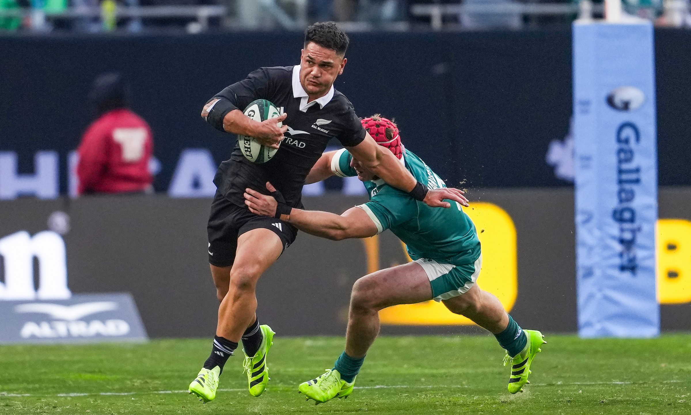 Quinn Tupaea gets around an Irish defender at Soldier Field.