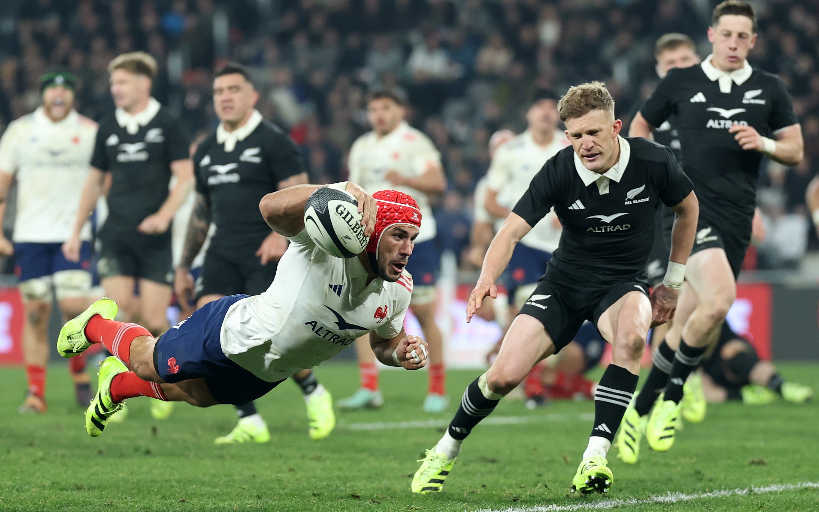 France wing Gabin Villière scores against the All Blacks in Dunedin.