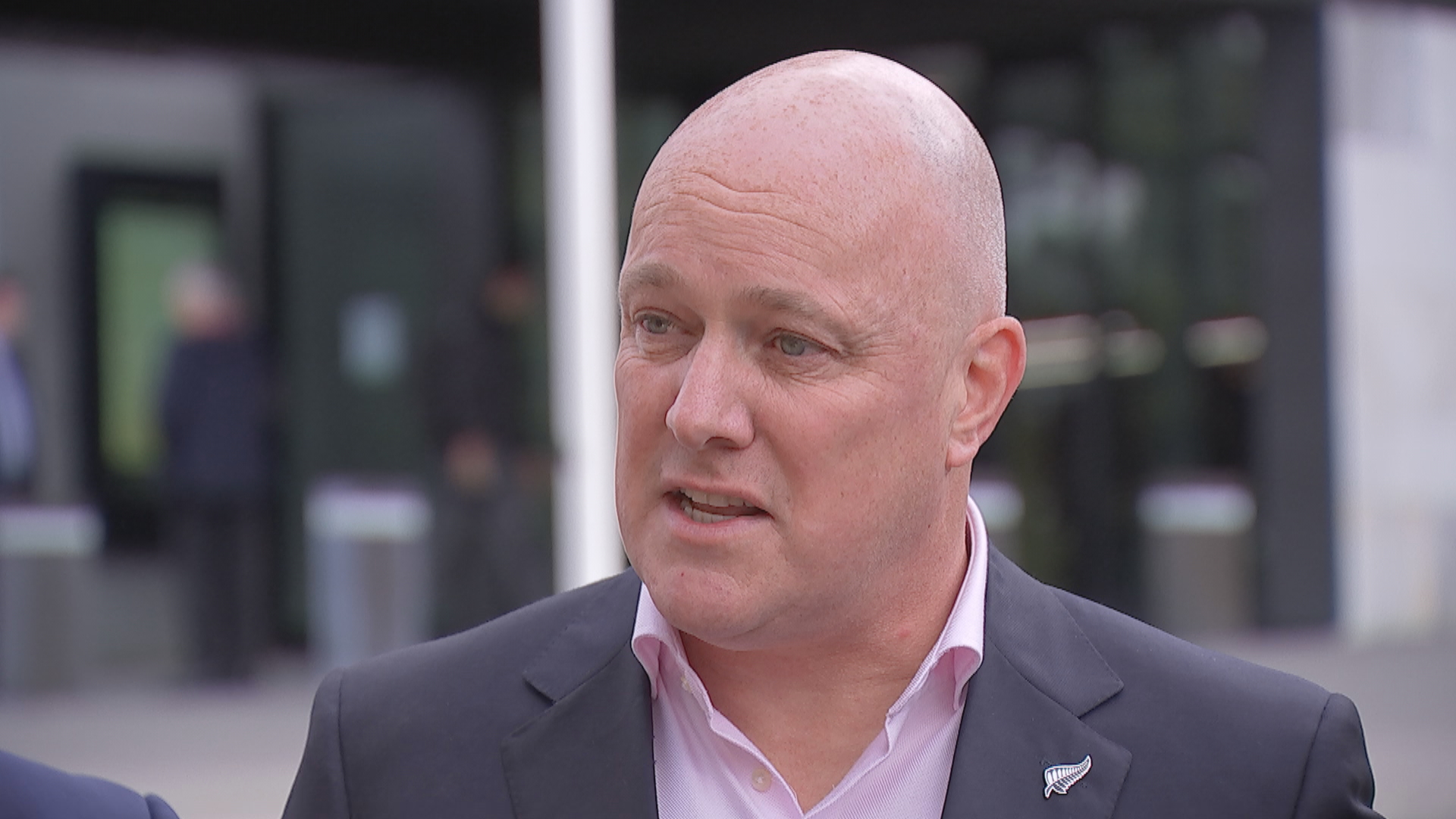 Christopher Luxon speaks to reporters outside of Parliament on April 2023.