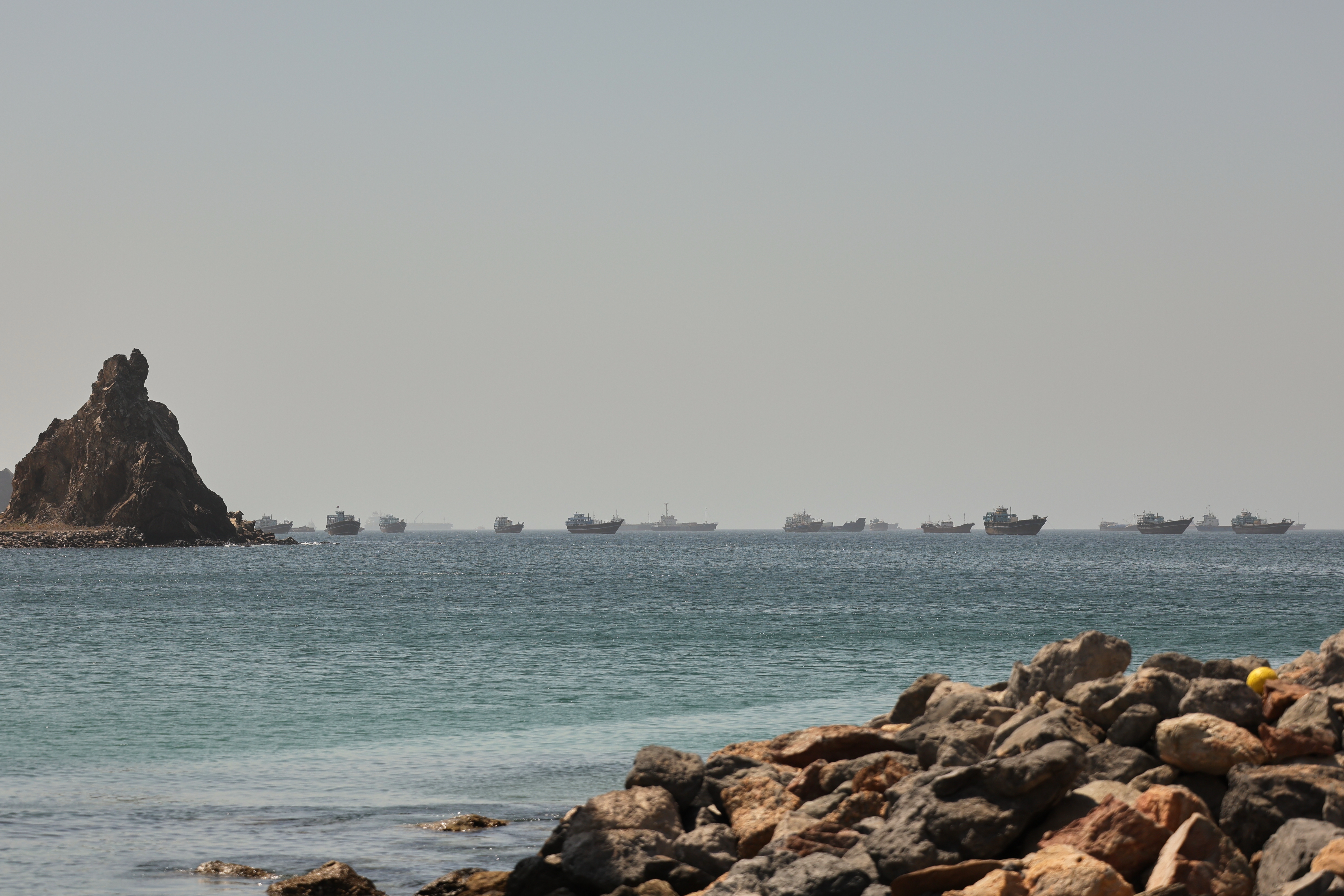 Tankers and cargo vessels are seen in the Gulf of Oman, along shipping routes linking the Strait of Hormuz and the Arabian Sea.