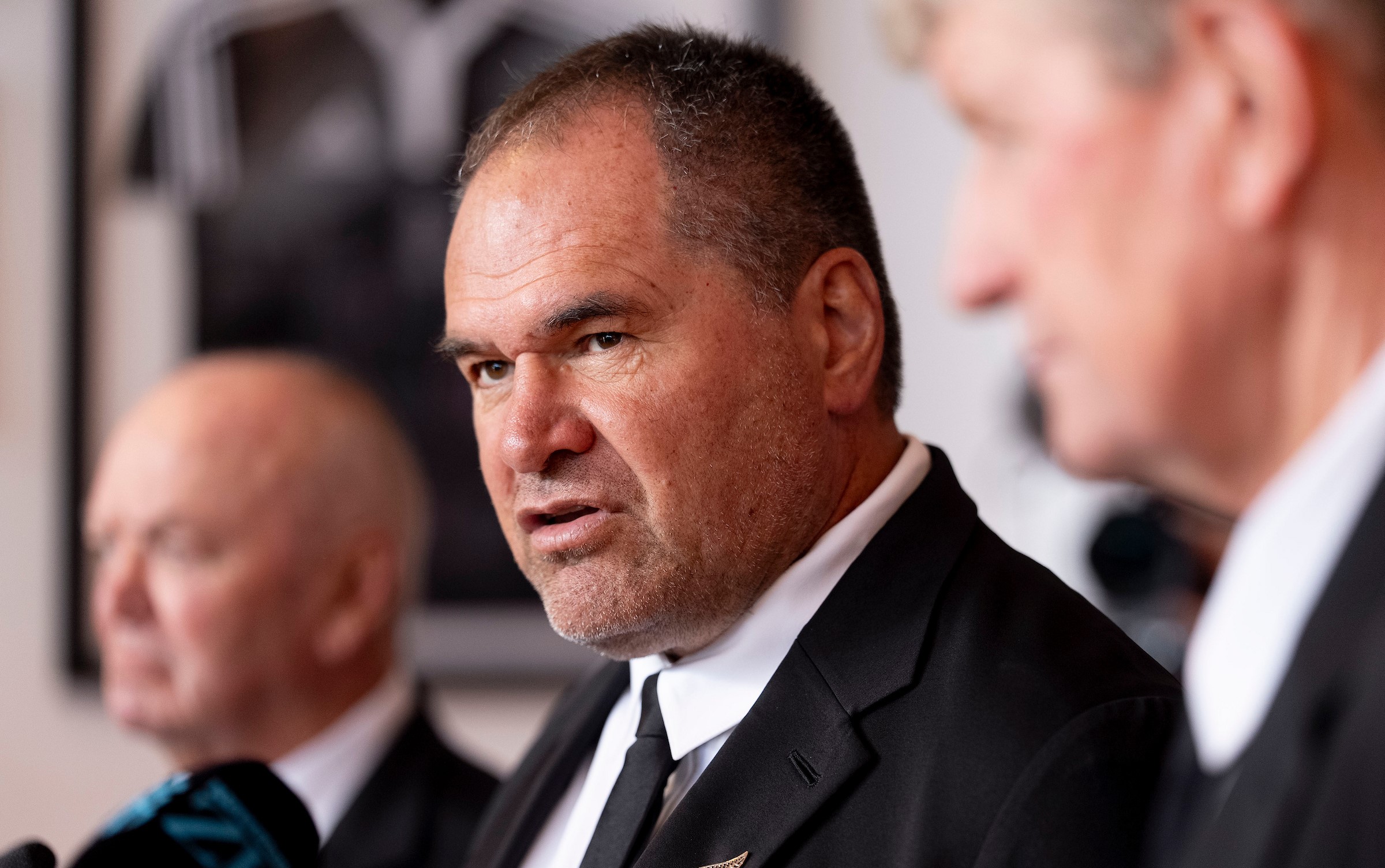 All Blacks head coach Dave Rennie, pictured between selector Sir Graham Henry, left, and assistant coach Neil Barnes, at today's squad announcement.