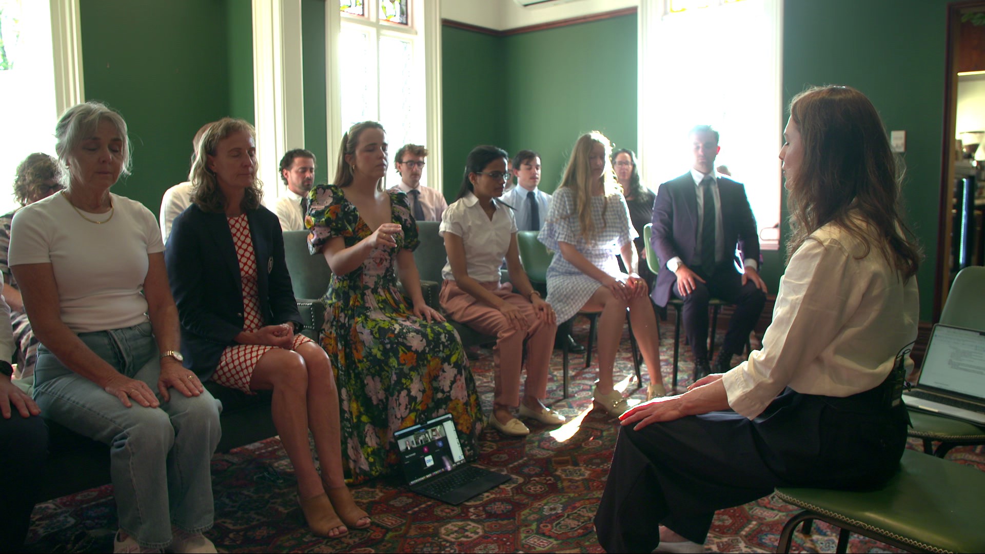 Jenafer Matthews teaches breathing to a corporate group. 