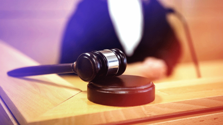 A file image of a judge in a courtroom.