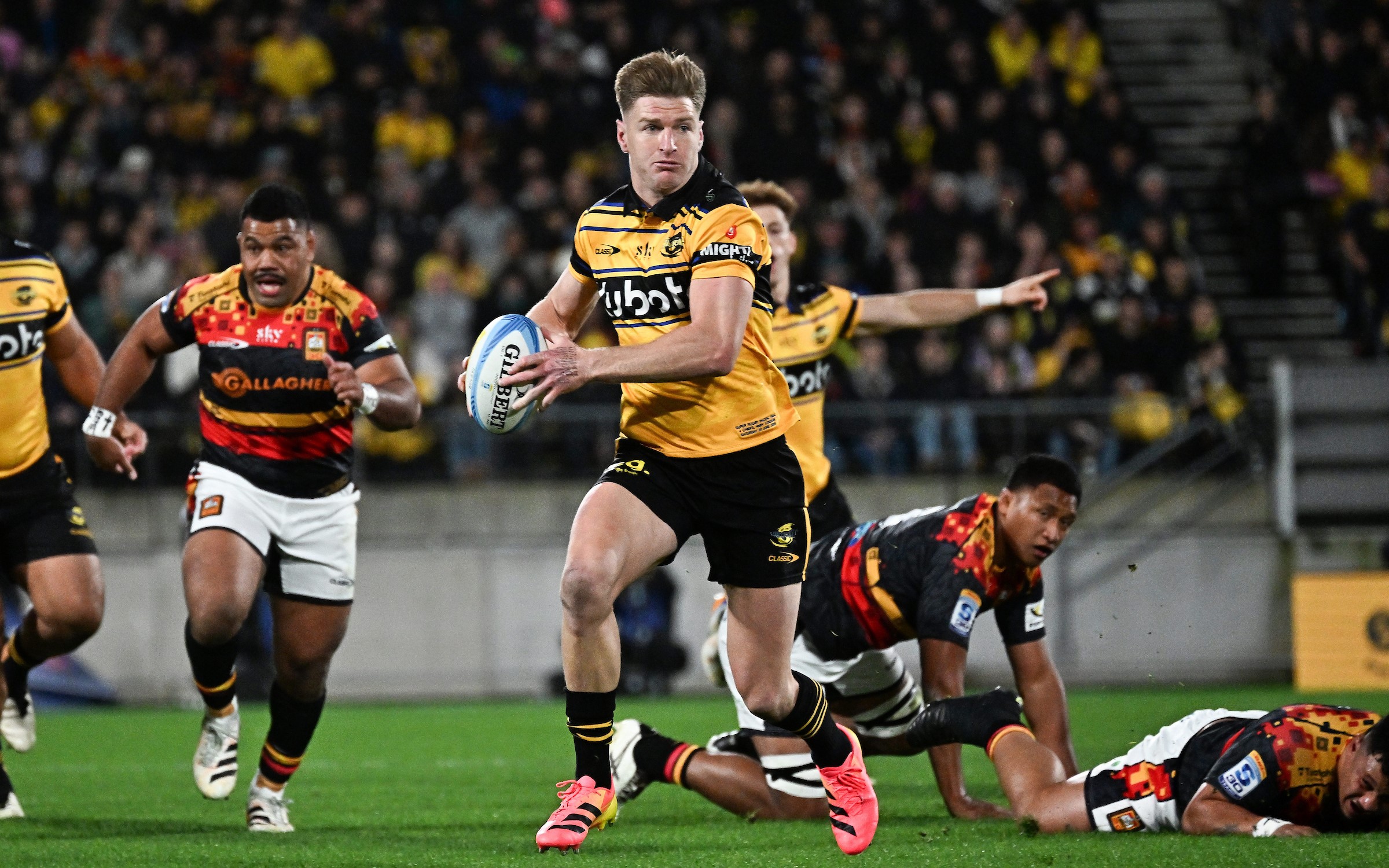 Jordie Barrett makes a break for the Hurricanes against the Chiefs in the recent Super Rugby grand final.