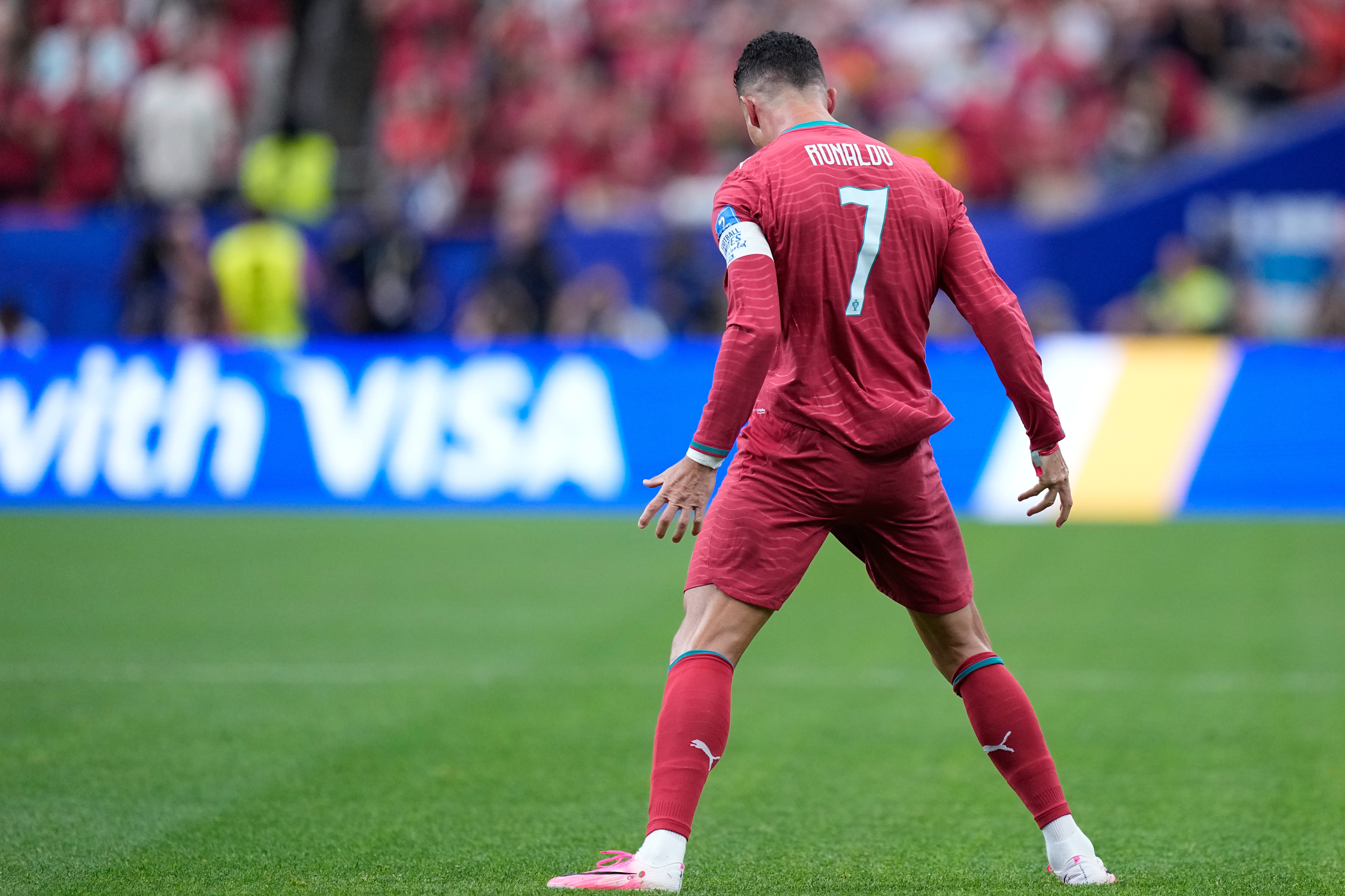 Portugal's Cristiano Ronaldo celebrates after scoring the opening goal during the World Cup Group K match between Portugal and Uzbekistan in Houston. 