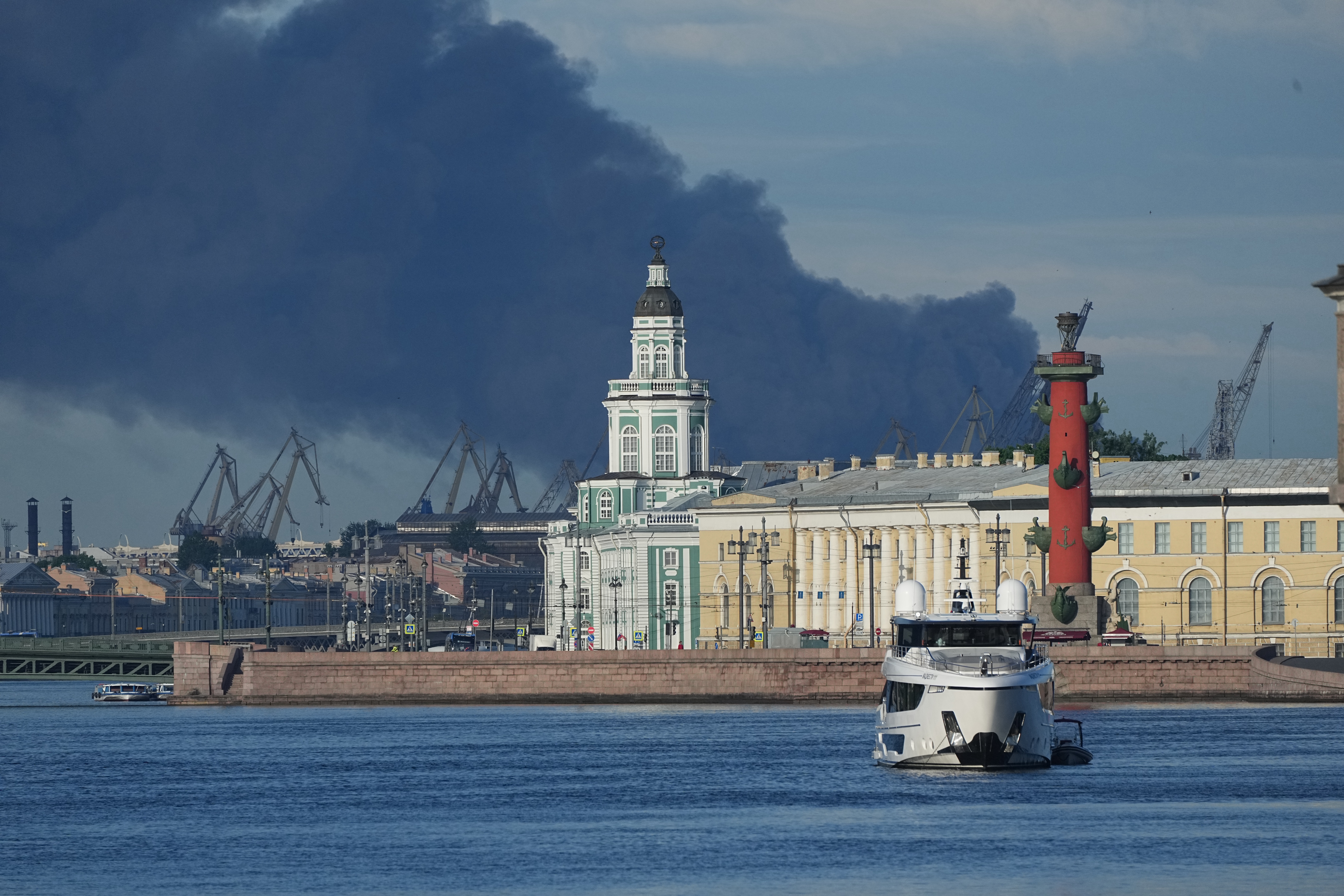 A plumes of black smoke is seen over the port of St. Petersburg, Russia, Wednesday, June 3, 2026, after a Ukrainian drone attack. 