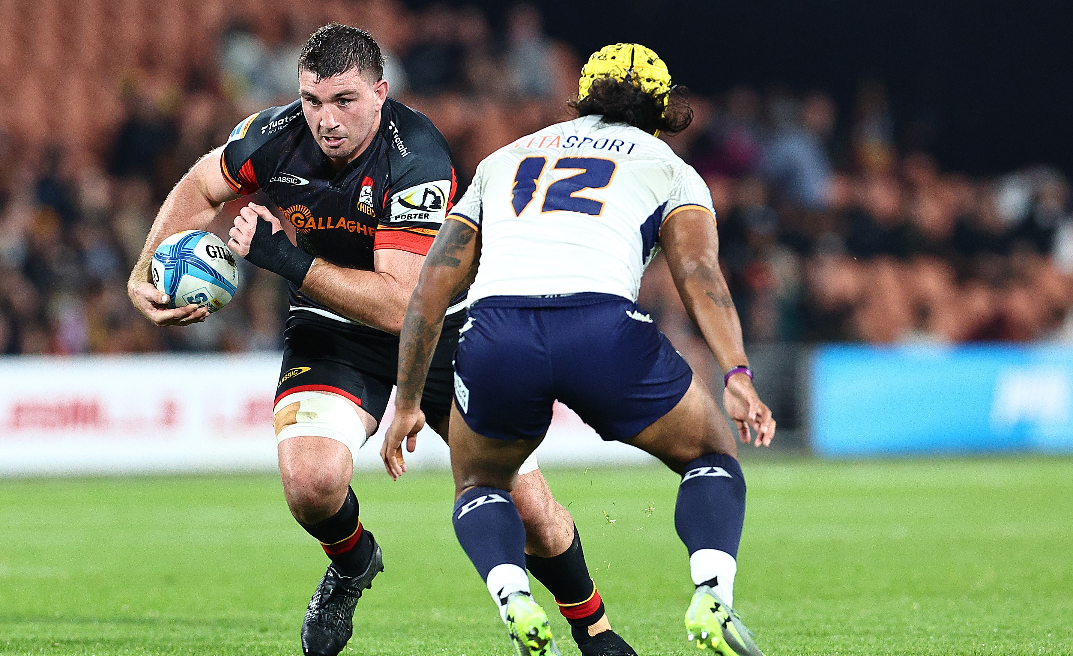 Simon Parker carries the ball for the Chiefs against Moana Pasifika this season.