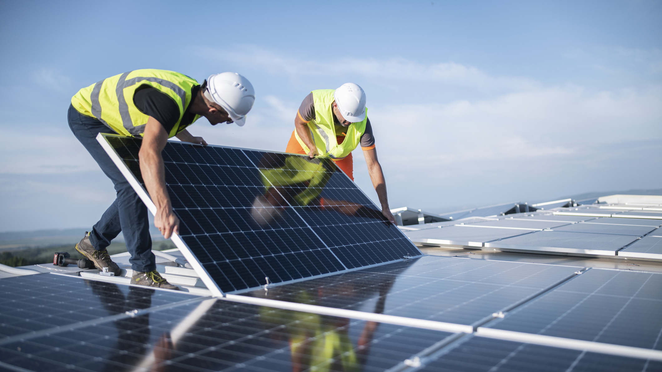 Installing solar panels on a roof