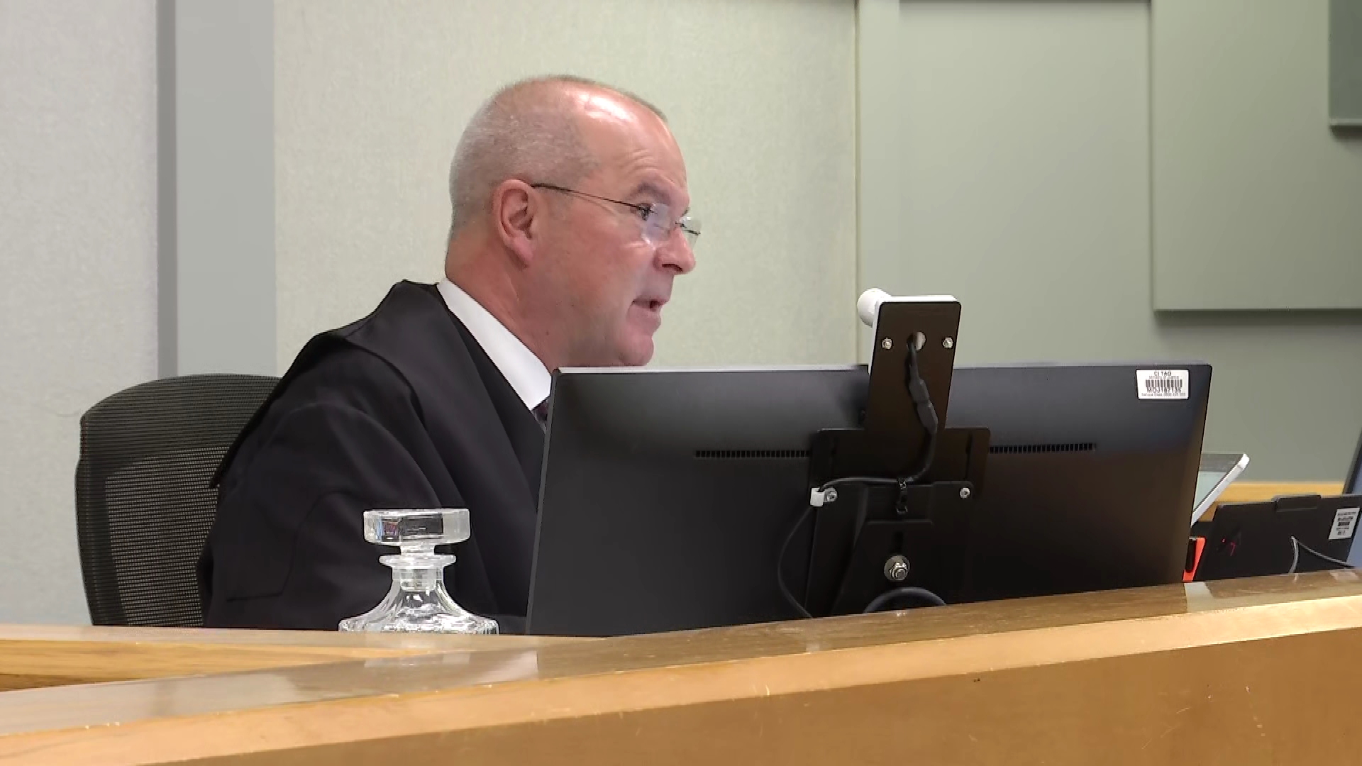 Justice Radich listens in Wellington's High Court. 