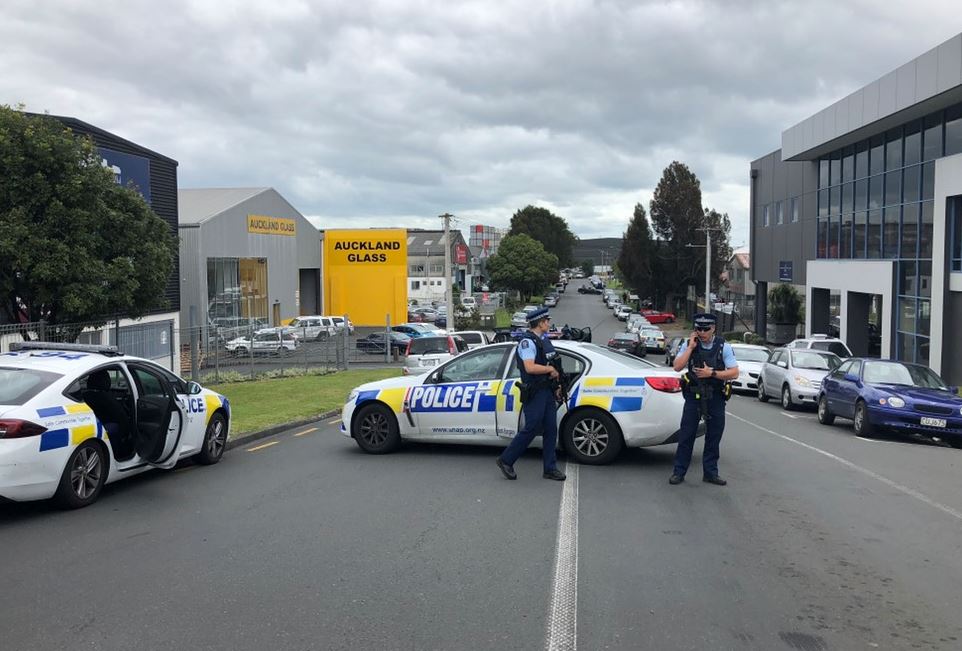 Five people in custody after armed police swarm Auckland street
