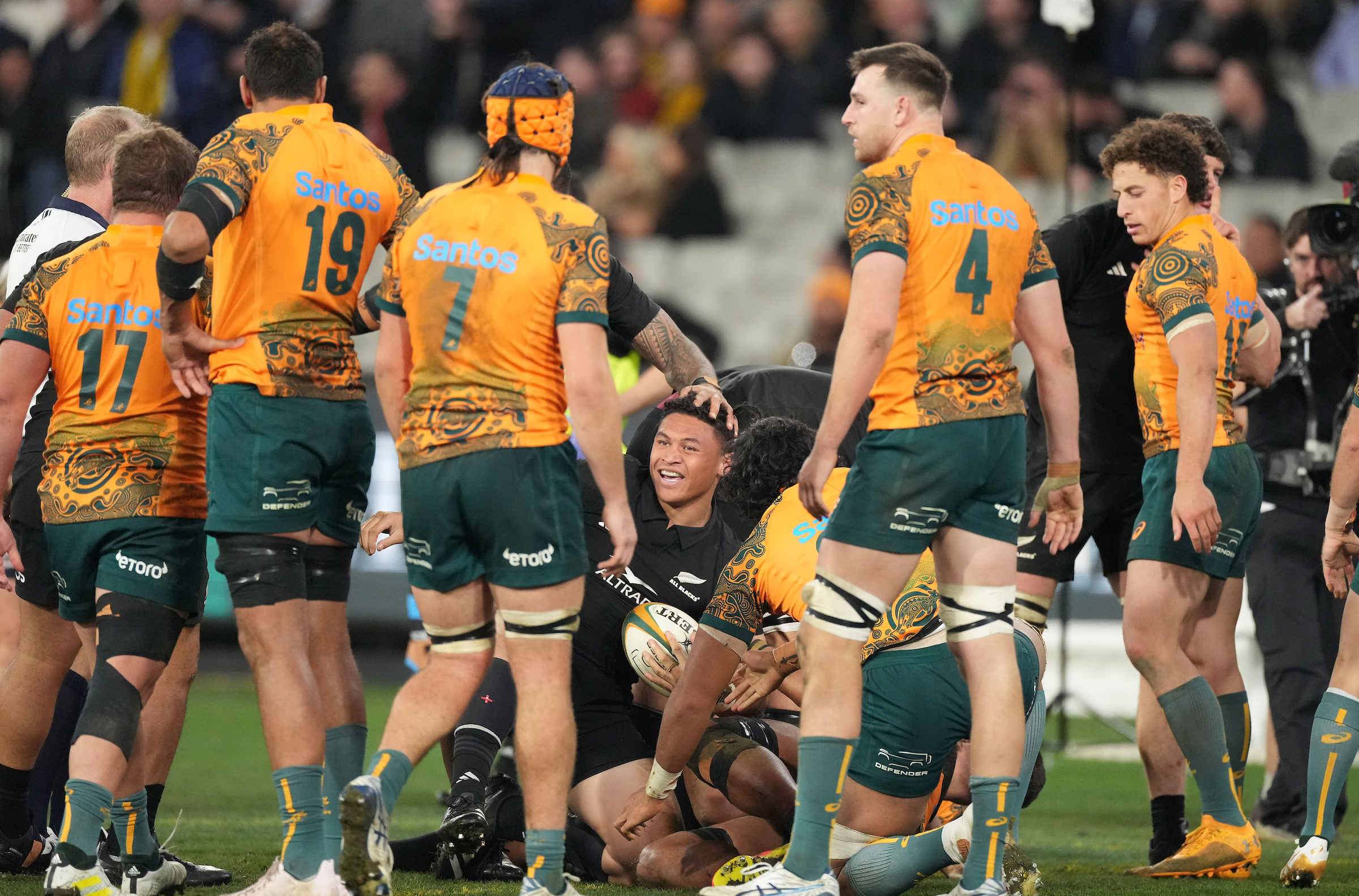 Caleb Clarke celebrates his try against Australia.