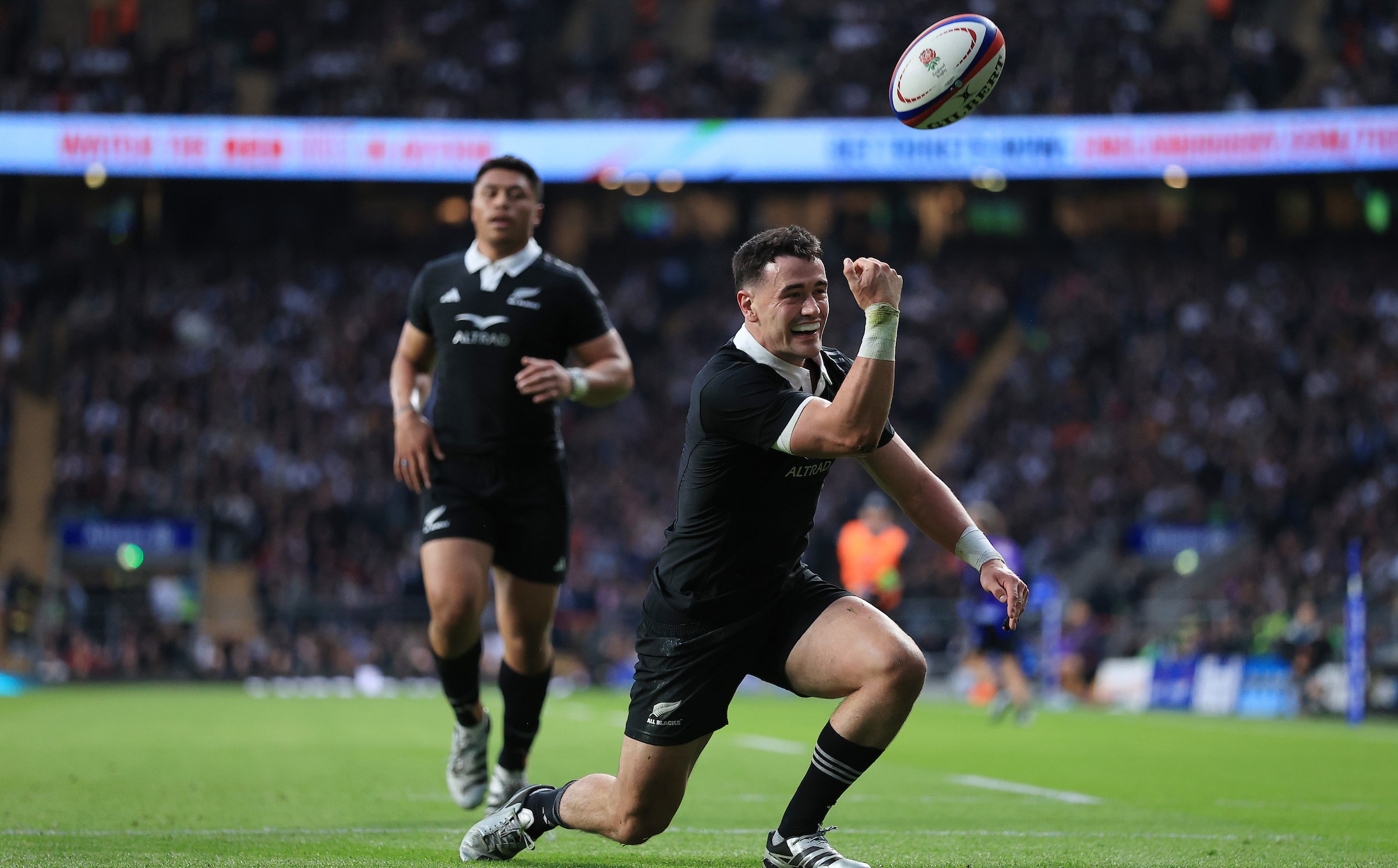 Will Jordan celebrates his try against England at Twickenham.